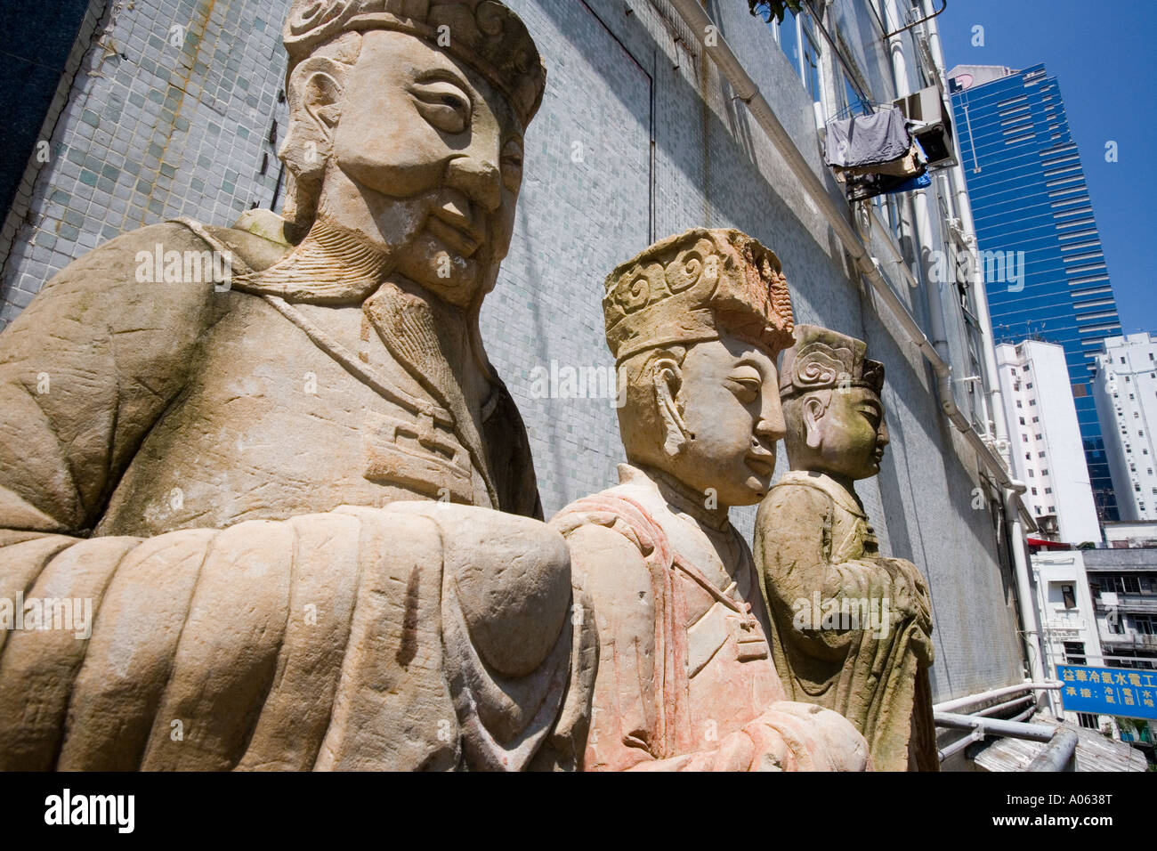 Old Chinese statues on a street in Hong Kong Stock Photo Alamy