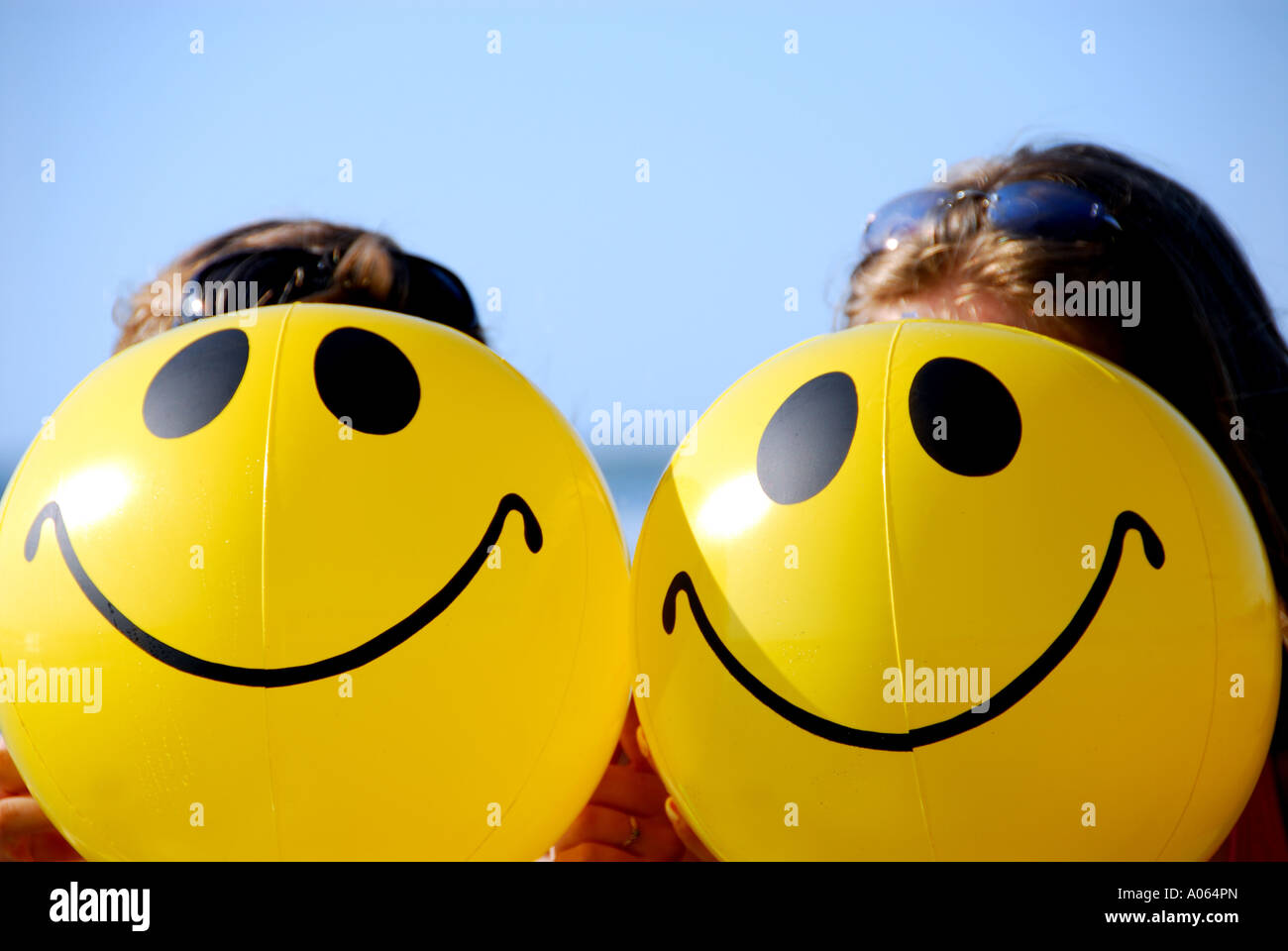 Smiley face beach balls hi-res stock photography and images - Alamy