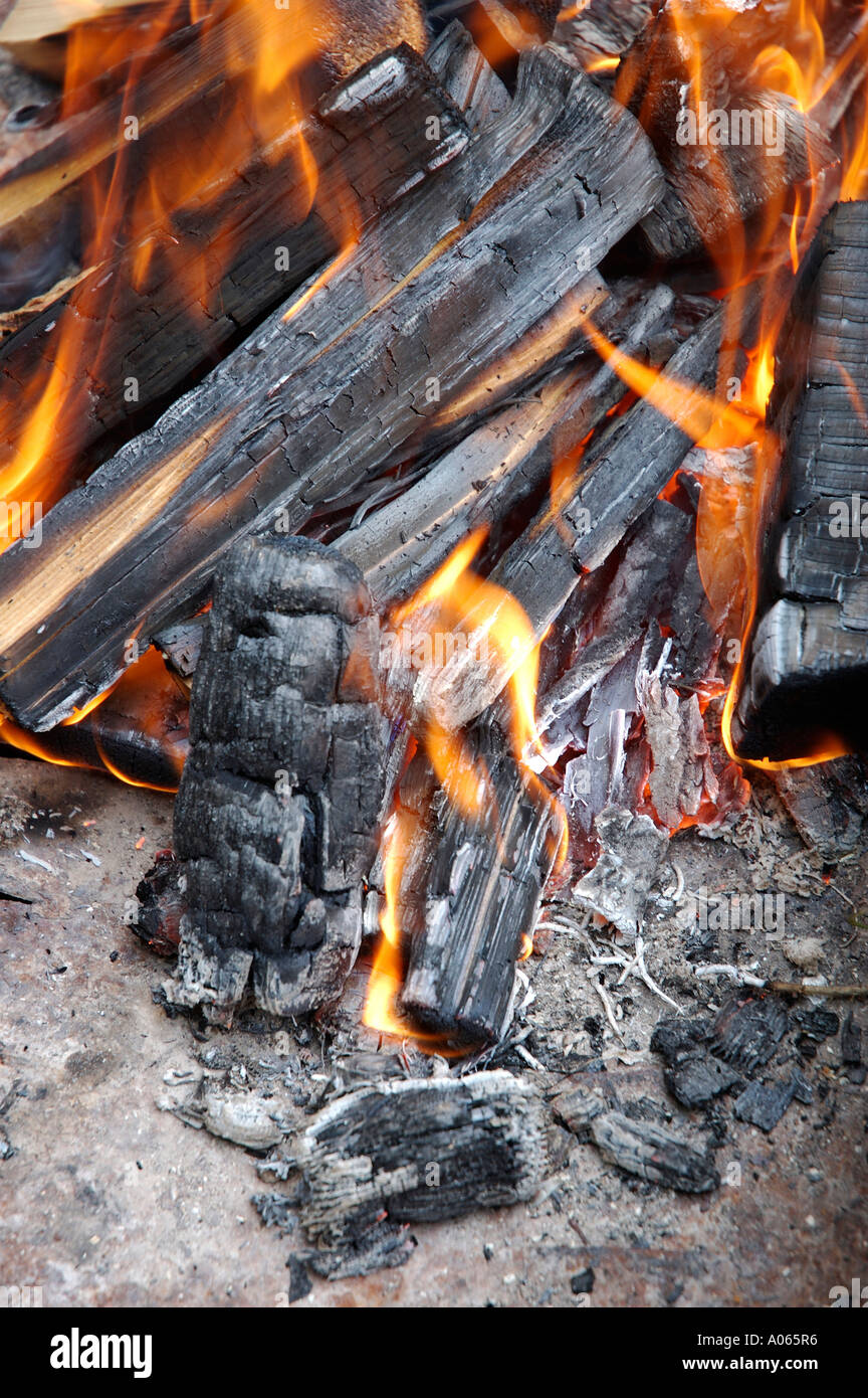 Front view of burning wood seen with bright flames Stock Photo