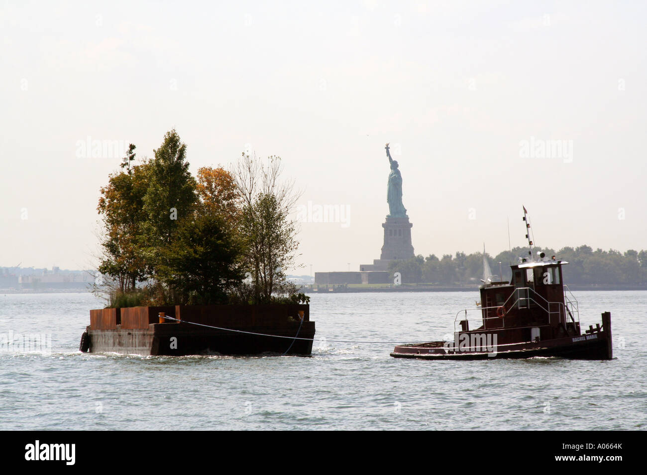 "Floating Island" being tugged around Manhattan Island Stock Photo Alamy