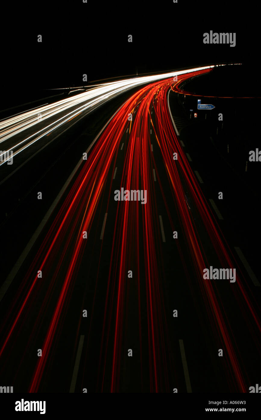 Trails of vehicles are seen on the highway at night Stock Photo - Alamy