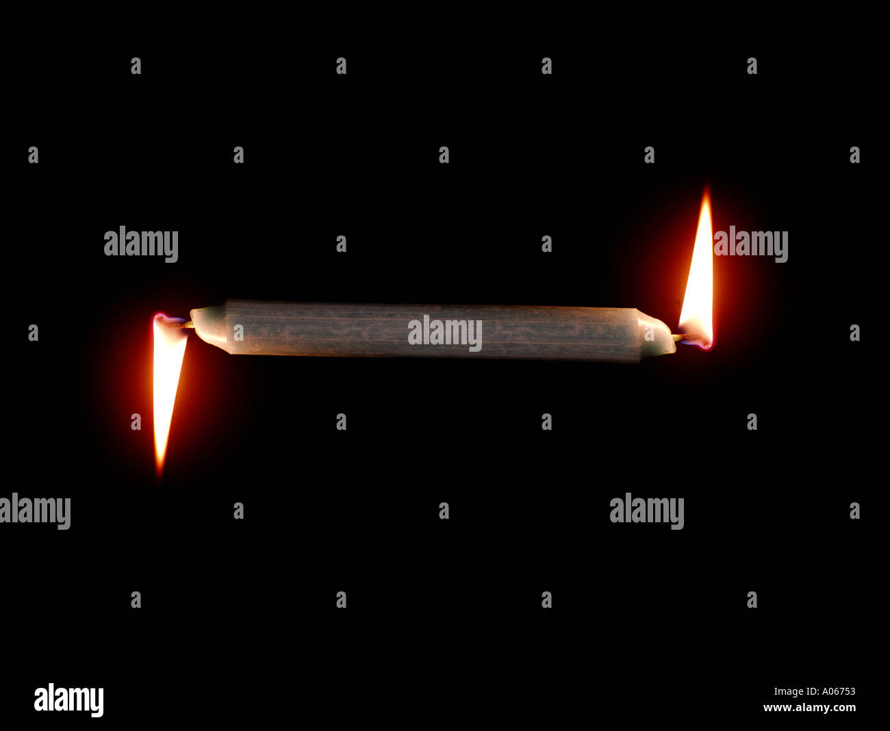 Burning Candle At Both Ends