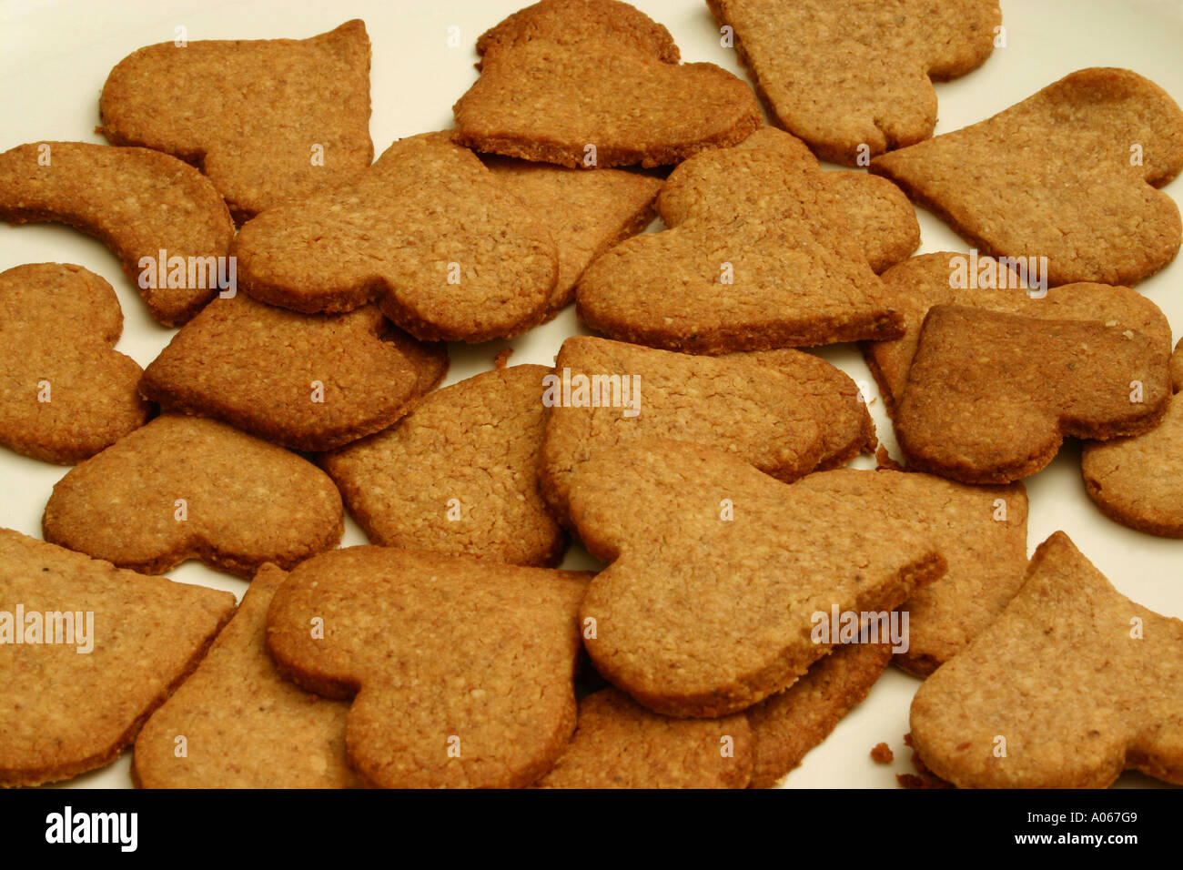 Heart shaped cookies are baked and kept at one place Stock Photo