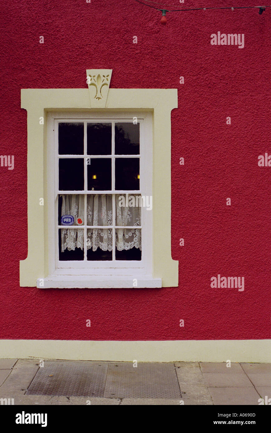 Window in red wall Stock Photo - Alamy