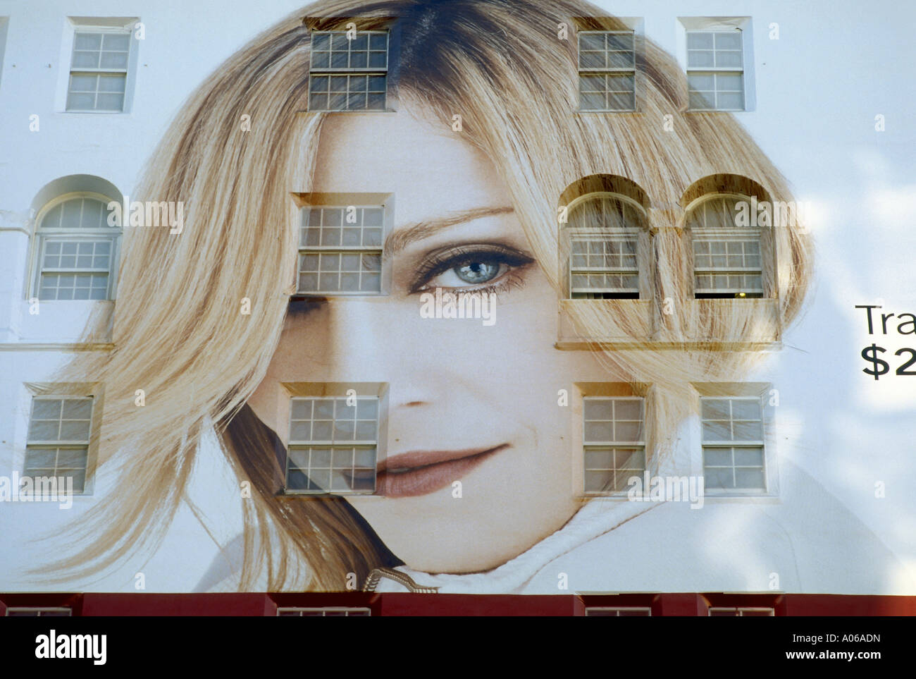 Promotional mural featuring famous pop singer Madonna announcing store opening of Swedish clothing store chain Hennes & Mauritz Stock Photo
