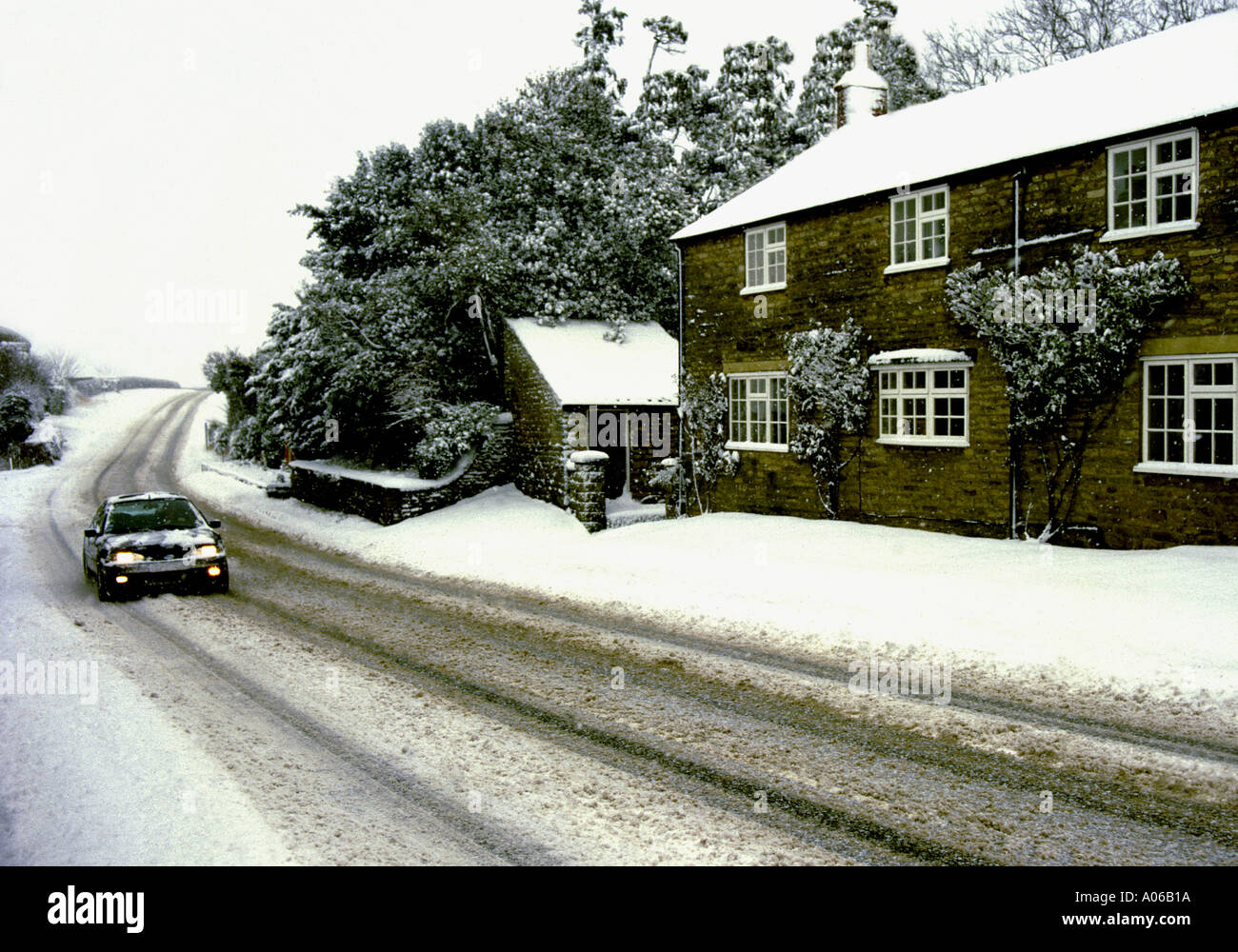 Snow on country road North Yorkshire England Stock Photo