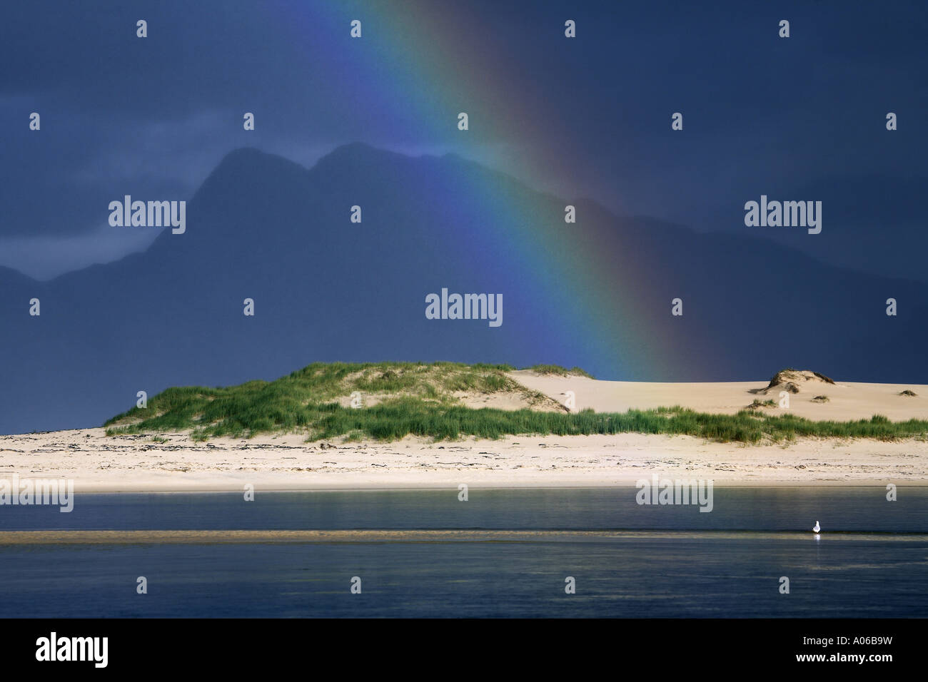 rainbow in a stormy sky Stock Photo - Alamy