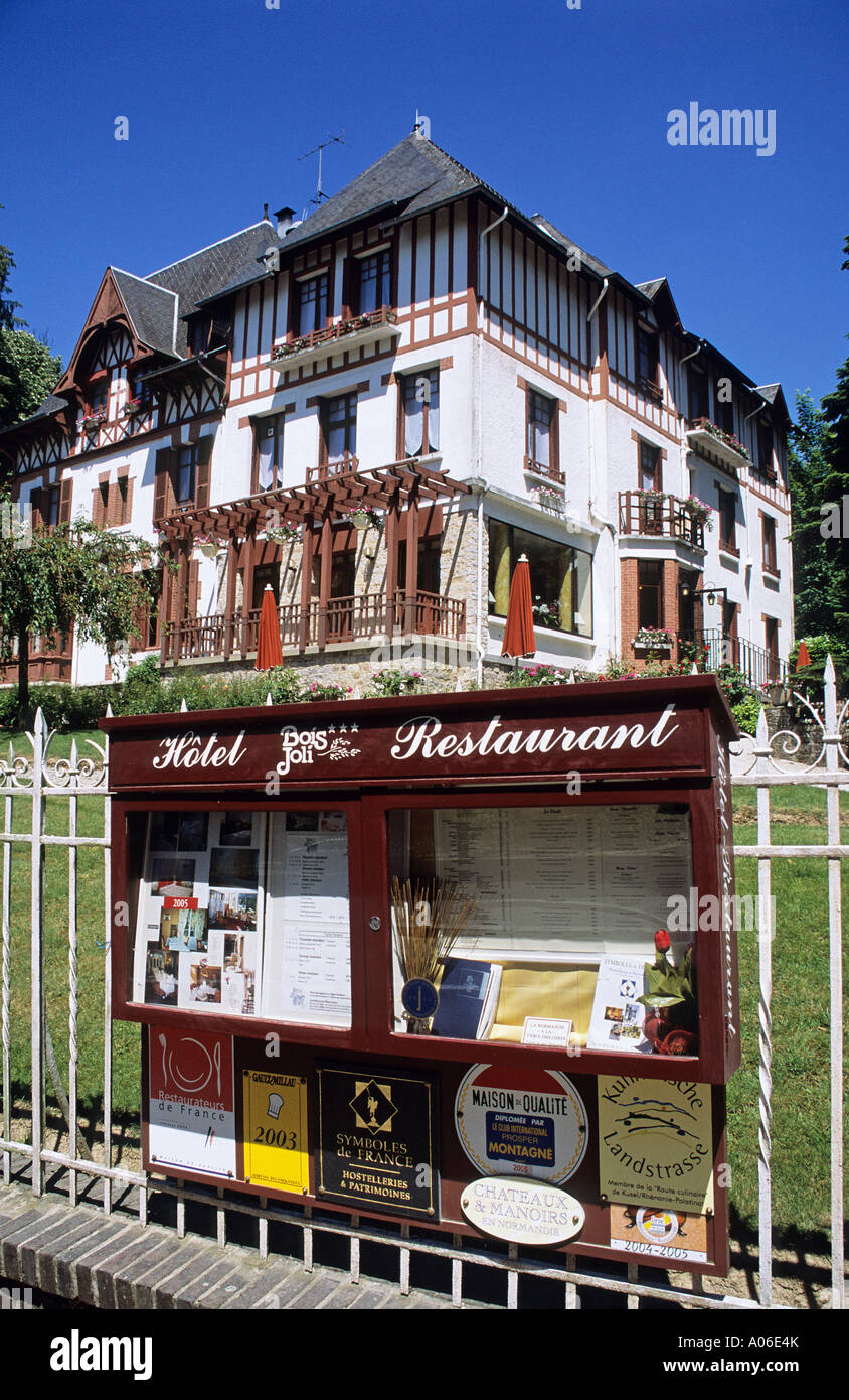 Detail of menu board on railings of Bois Joli hotel and restaurant in Bagnoles de L Orne Stock Photo