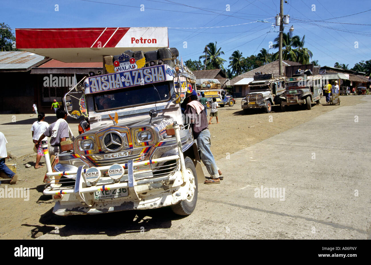Philippines Palawan Quezon Town Centre people boarding local jeepney Stock Photo