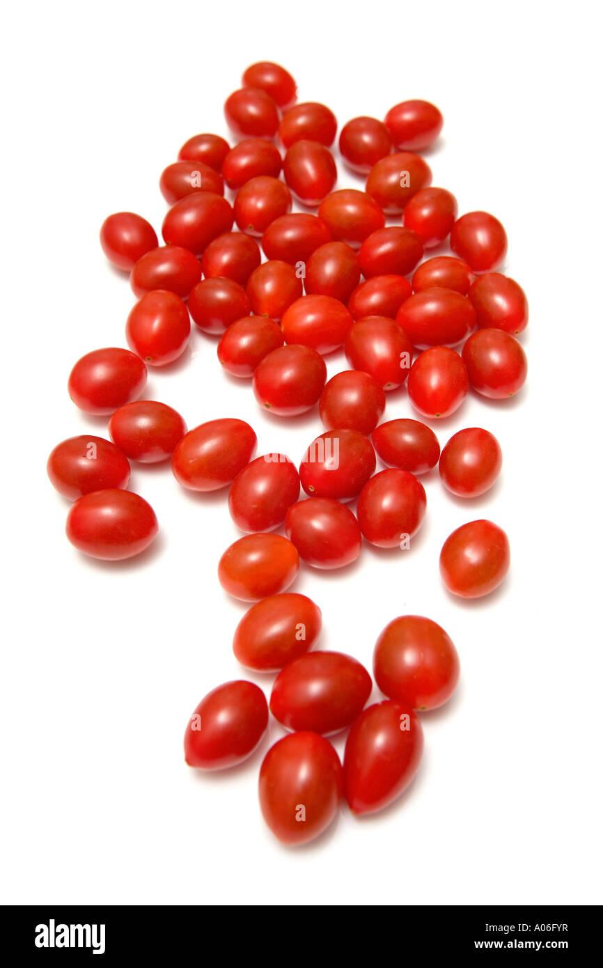 Cherry tomatos isolated on a white studio background Stock Photo - Alamy