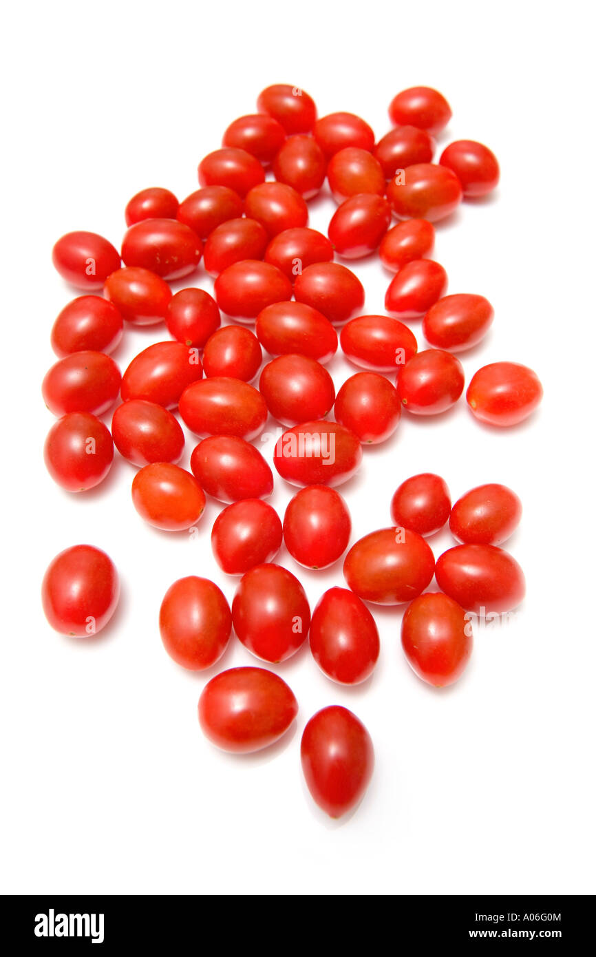 Cherry tomatos isolated on a white studio background Stock Photo - Alamy