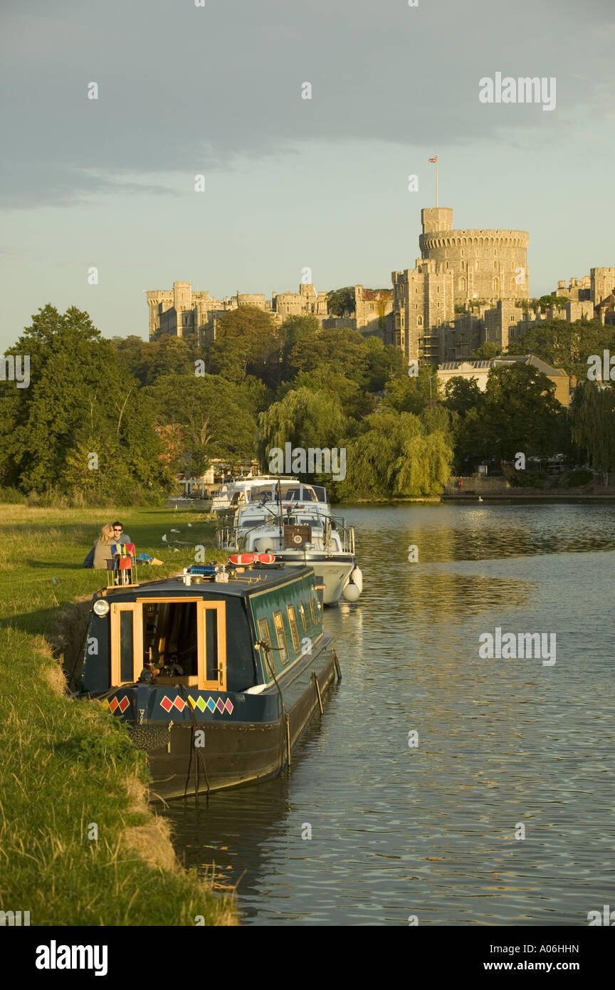 River Thames and narrow boat with main turret of Windsor Castle in