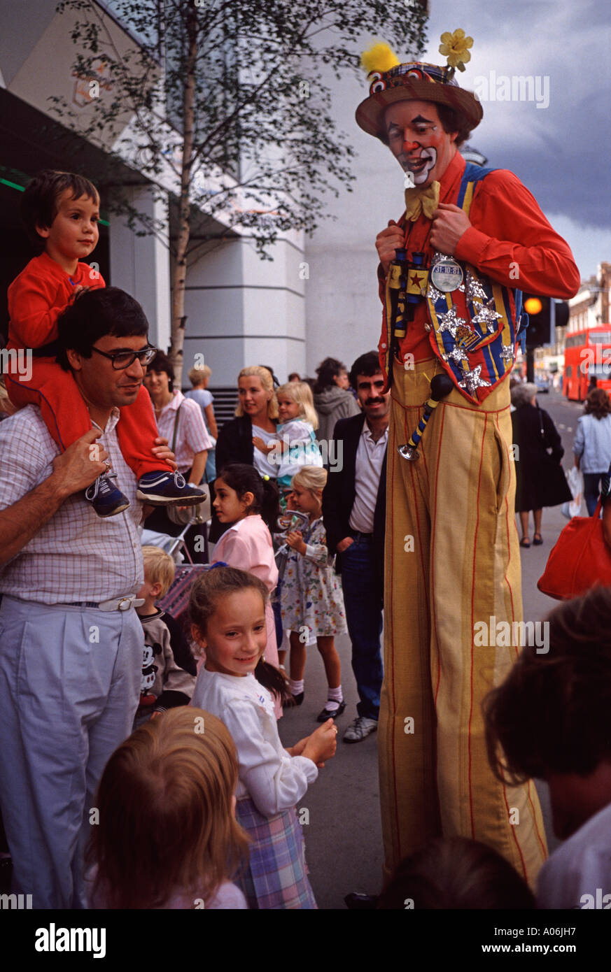 Clown on stilts Stock Photo Alamy