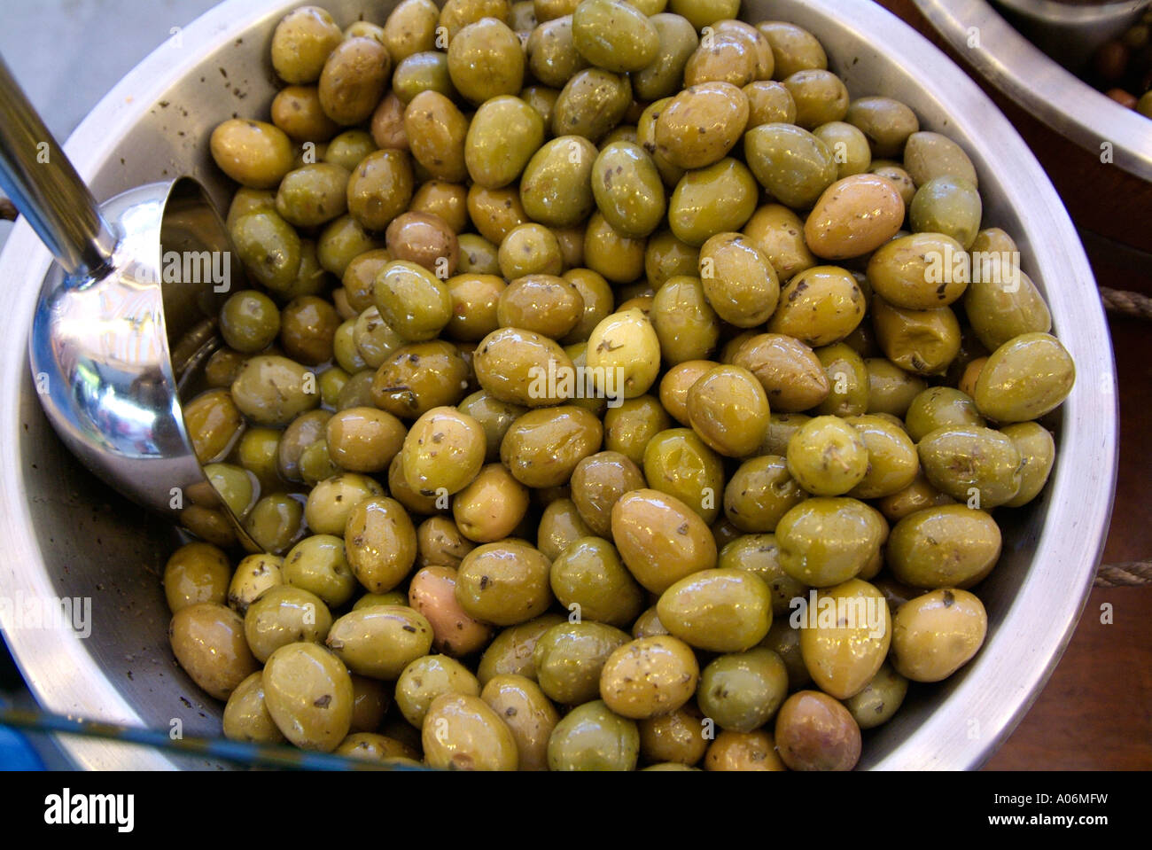 green olives savoury whole fresh ingredient prepared processed whole marinated party Mediterranean oil stuffed snack whole Stock Photo