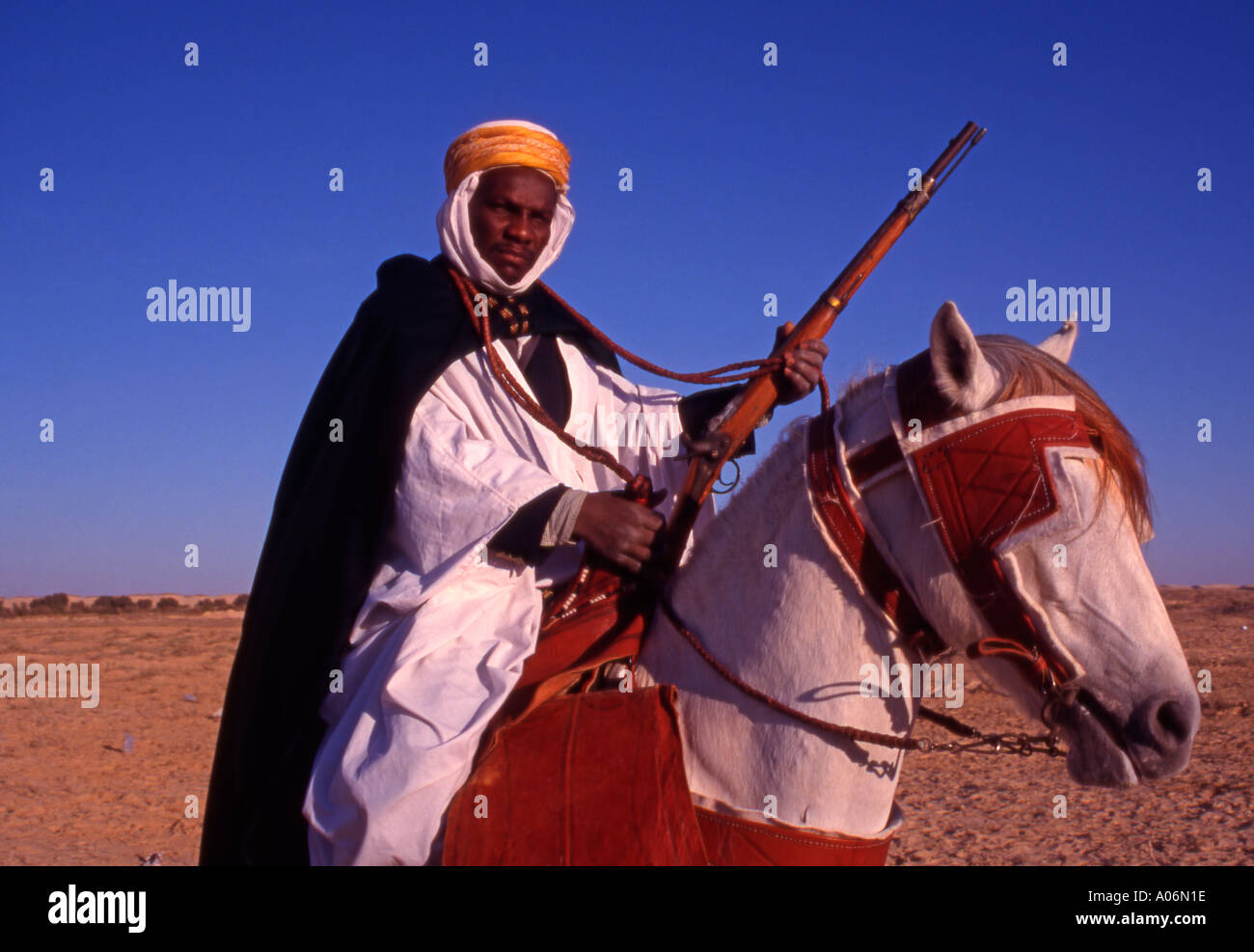 Horse rider at the Douz Desert Festival Tunisia North Africa Stock Photo