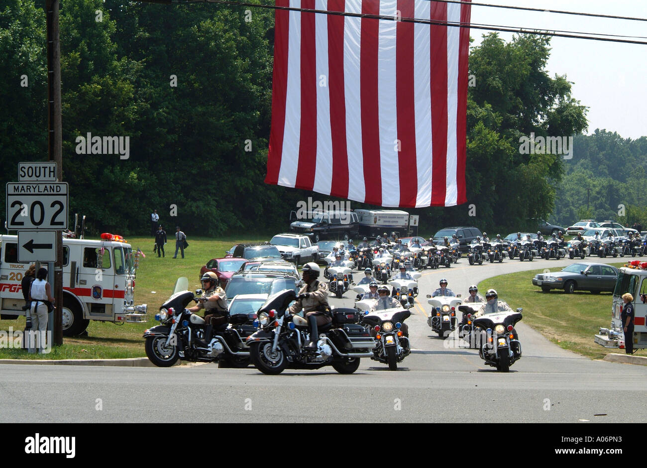 Hundreds of motorcycle police in funeral for policeman killed in line of duty Maryland USA Stock Photo