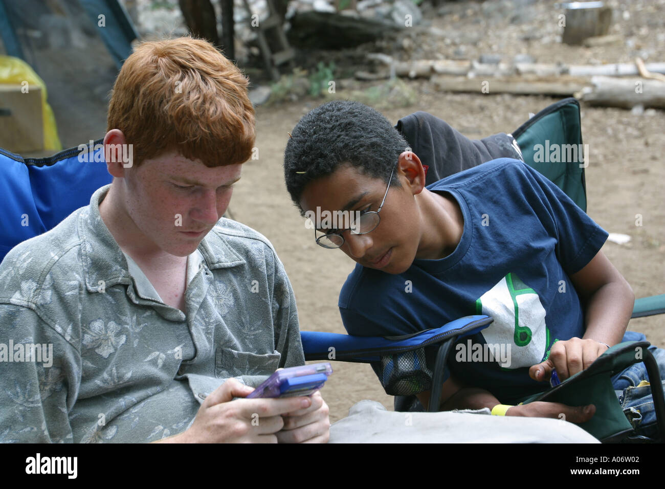 Two Boy Scouts taking a break from normal acticites to just play Stock ...