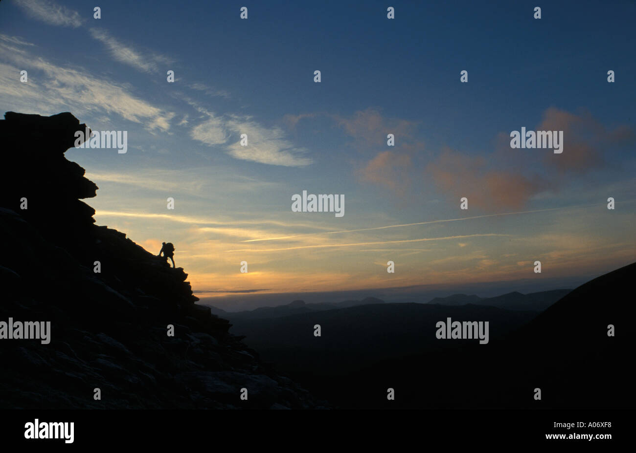 Silhouette of walker scrambling Deepdale Peak District England UK Stock ...