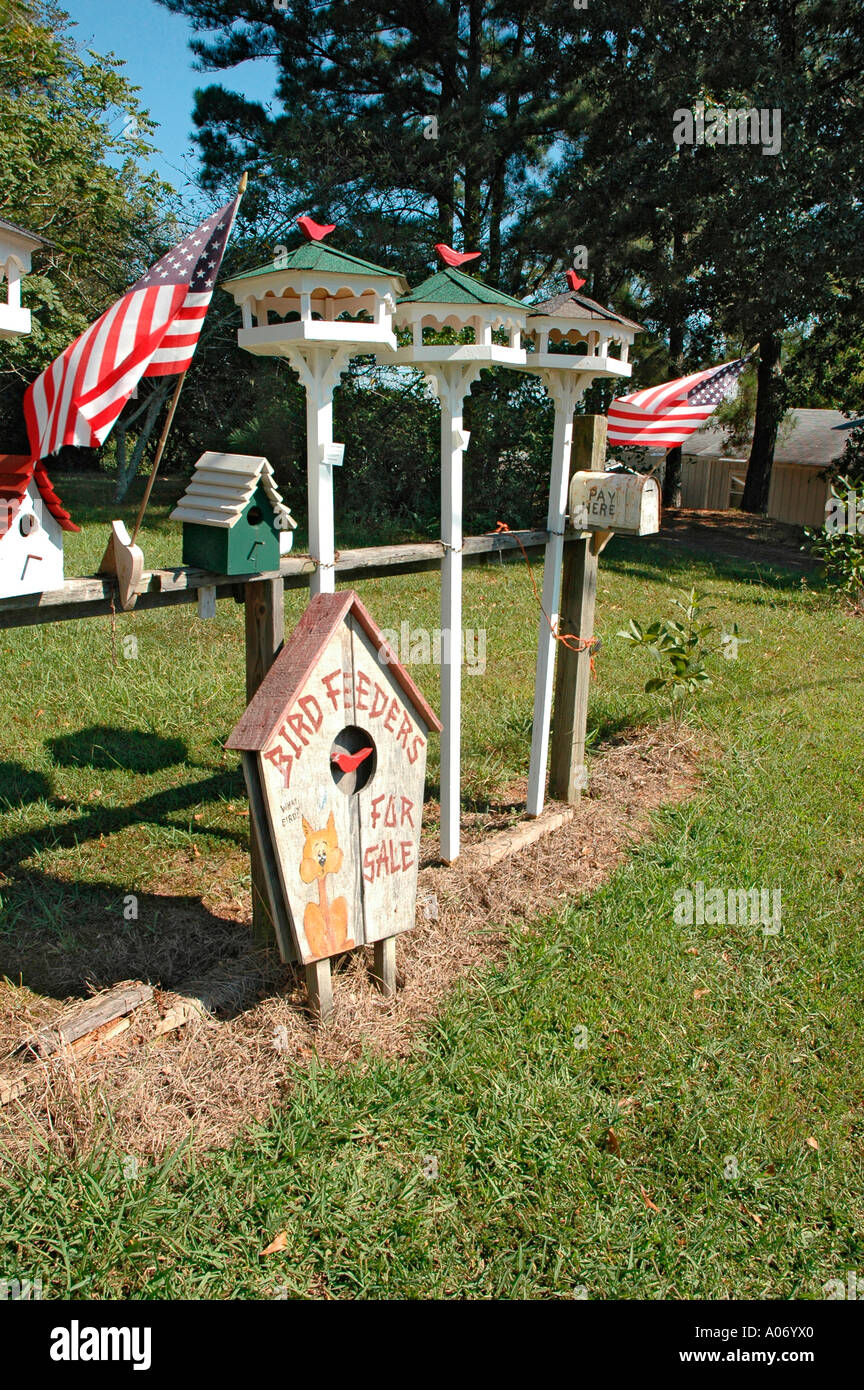 Home Made Birdhouses And Bird Feeders For Sale In Front Yard Of