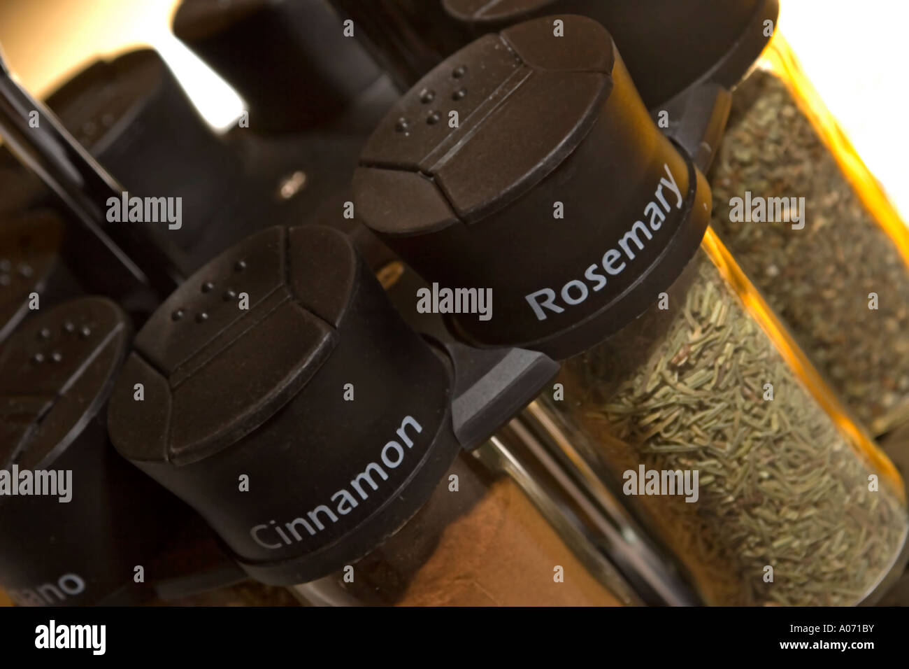Spice rack cinnamon and rosemary Stock Photo