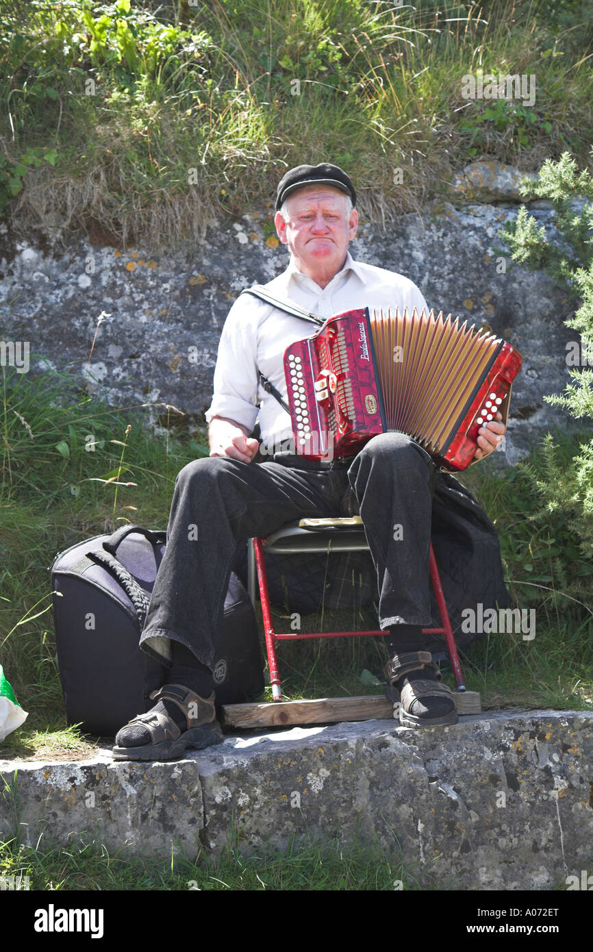 Man playing accordion Inishmore, Aran Islands, County Clare, Ireland
