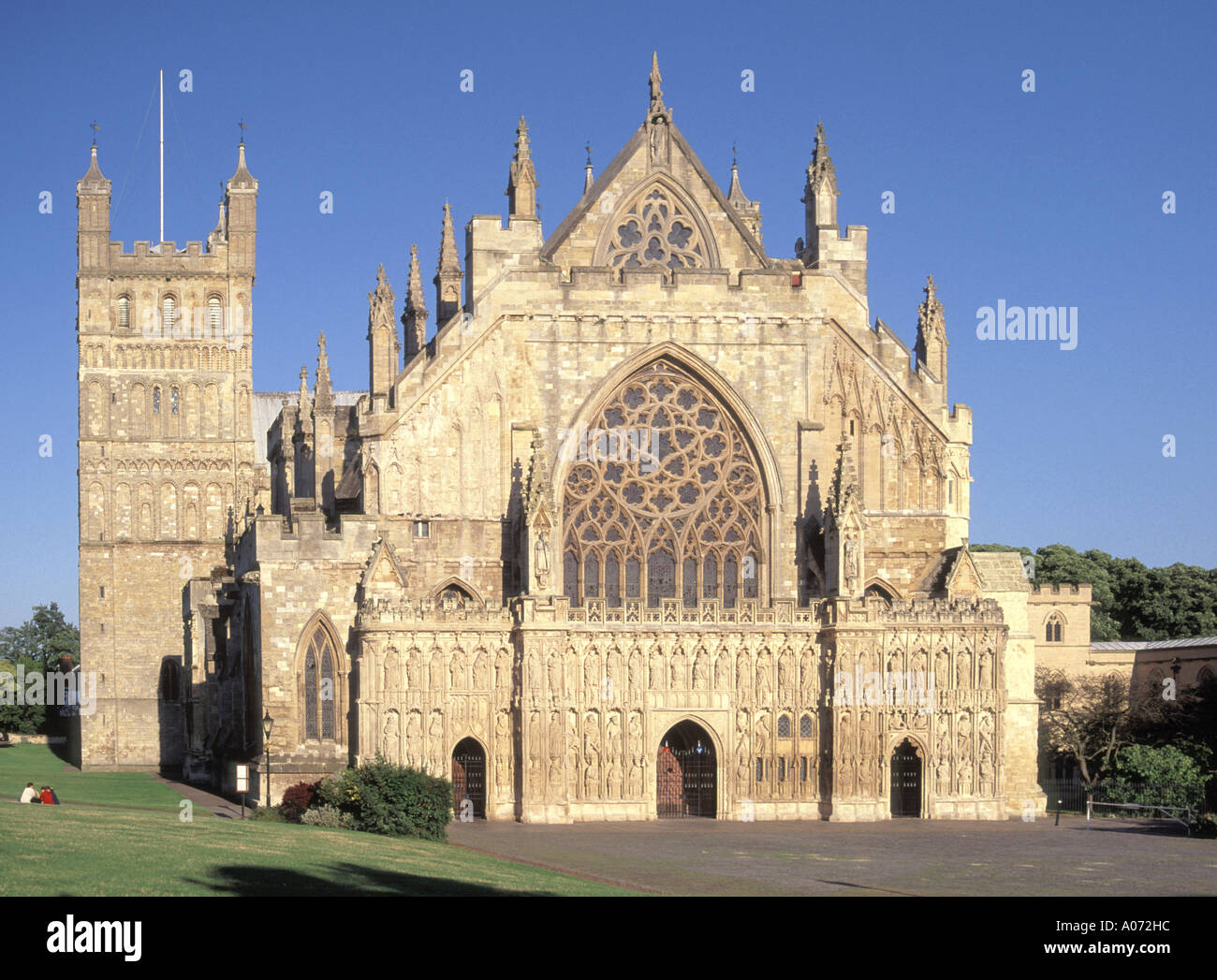 Norman Gothic architecture of the West Front & tower of historical Anglican Exeter Cathedral building  in Cathedral Square Devon South West EnglandUK Stock Photo