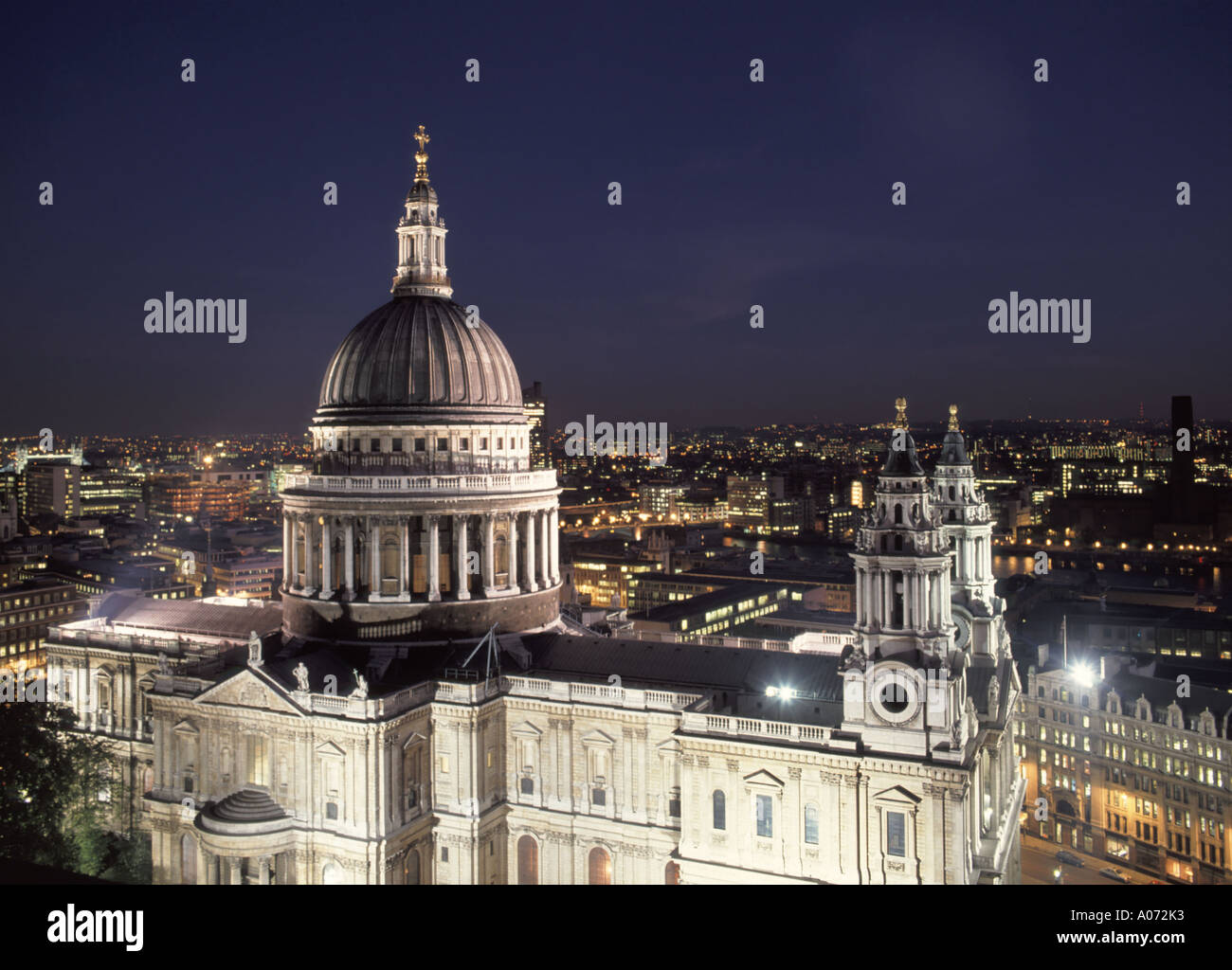 Iconic St Pauls historical cathedral Church of England religion Christopher Wren dome at dusk aerial view from above looking down on City of London UK Stock Photo
