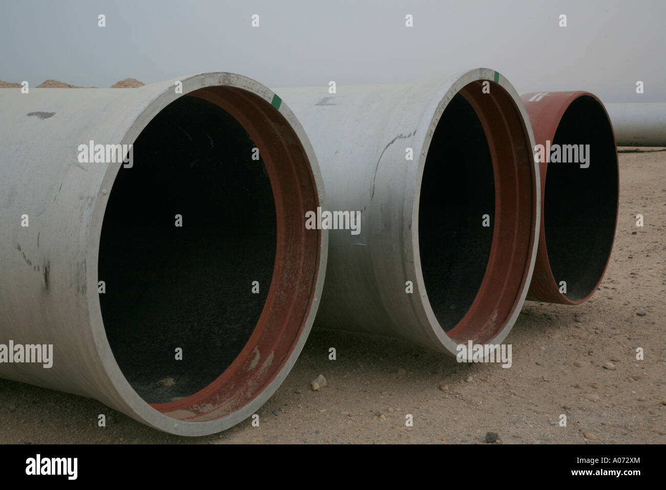 industrial pipes in the desert in kuwait middle east Stock Photo Alamy