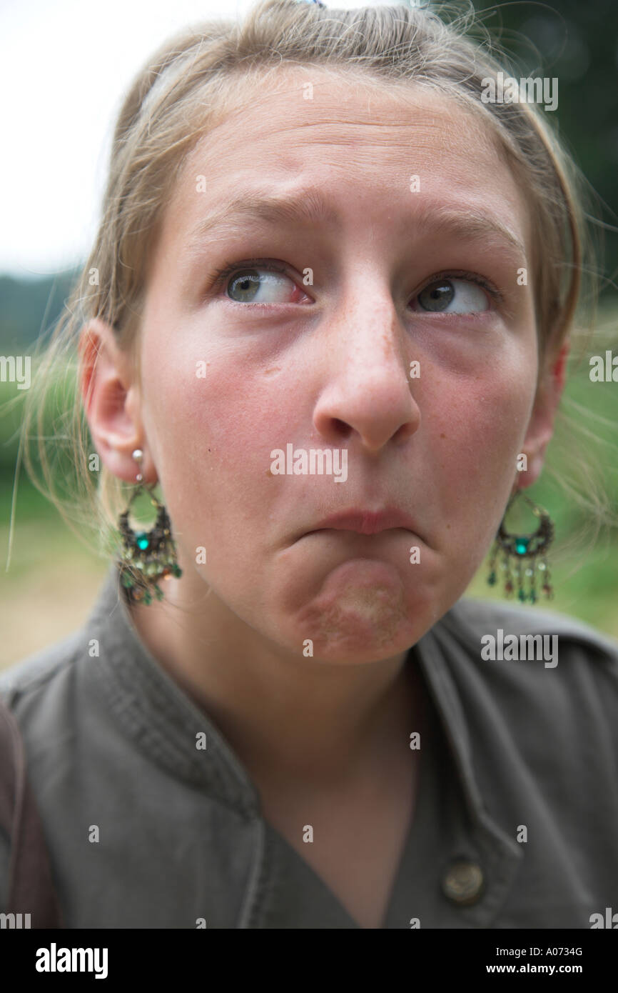 Young teenage girl pulling funny faces Stock Photo Alamy