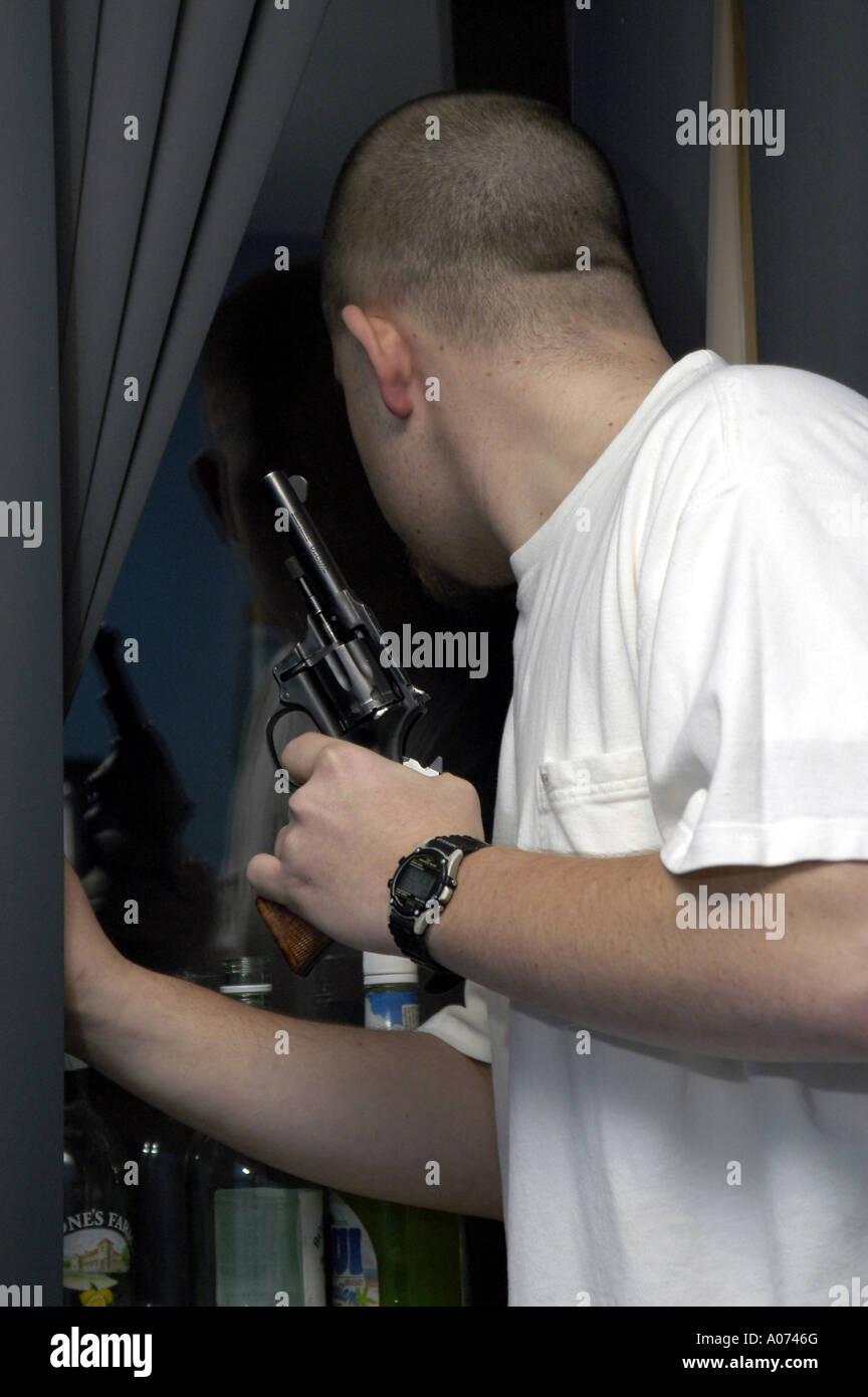 Gun paranoid skinhead Stock Photo