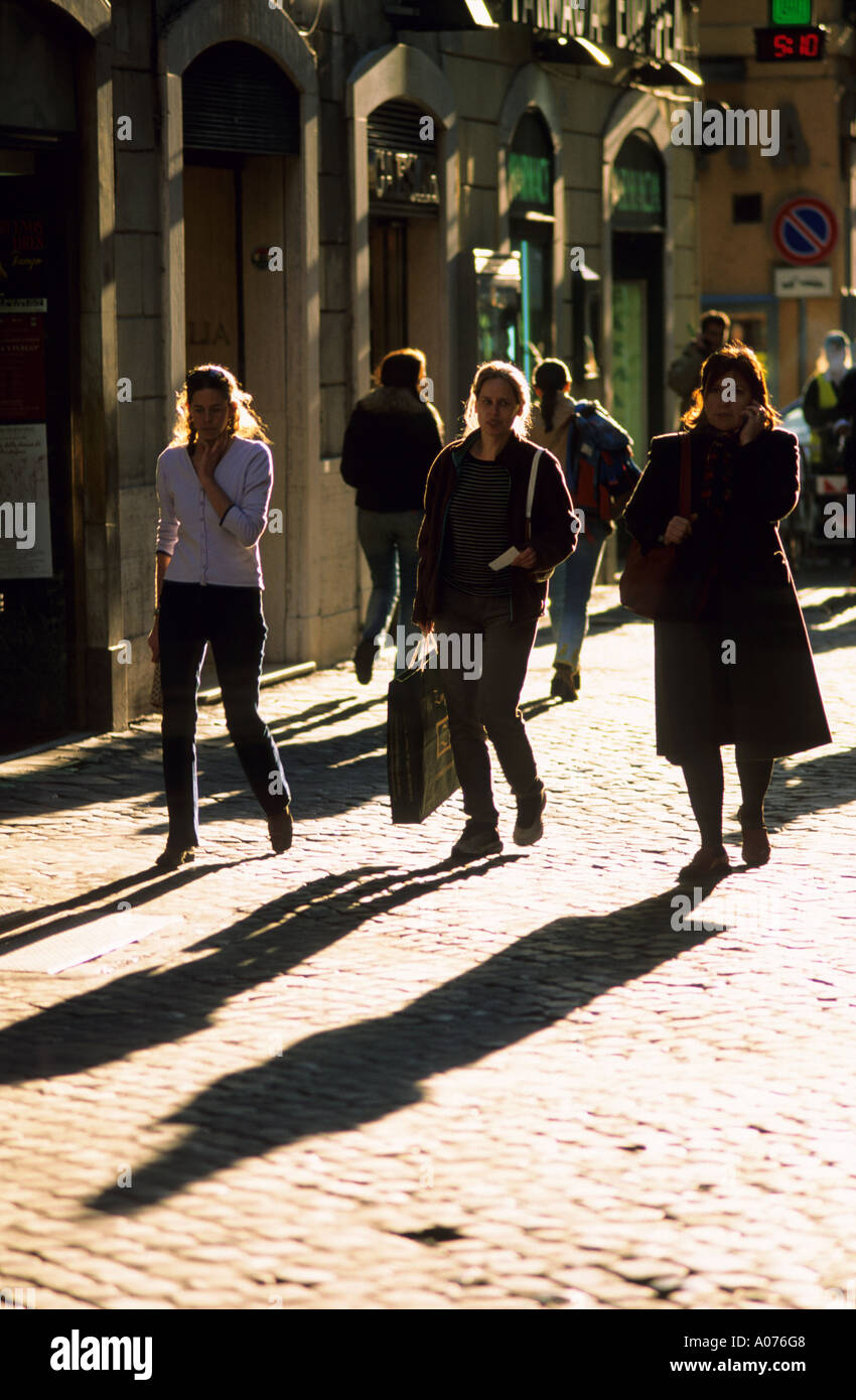 Pedestrians walking along the Via Della Croce in Rome, Italy. Stock Photo