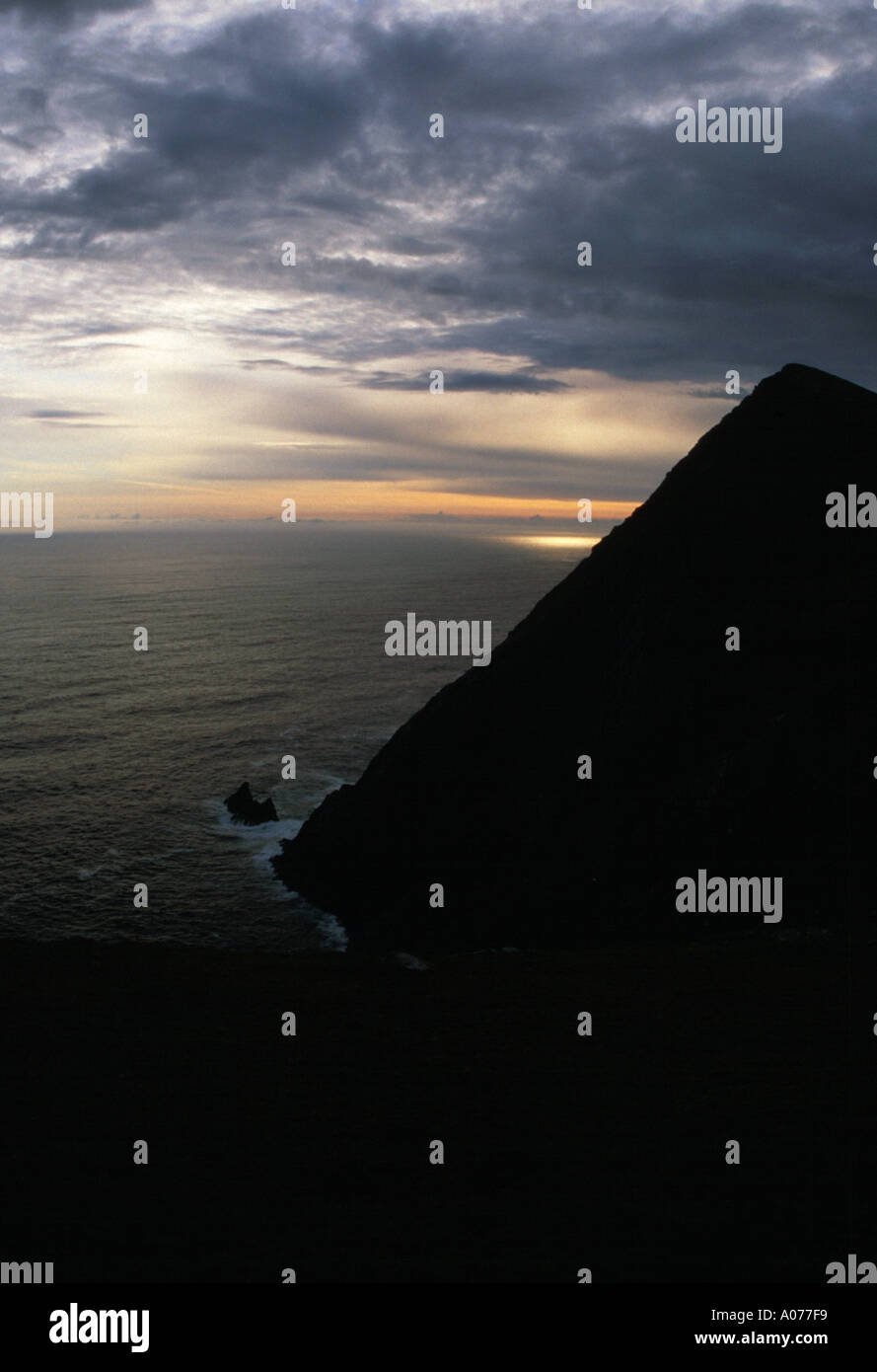 Sunset over Achill Head, Ireland, with mountain, sea and sky Stock Photo