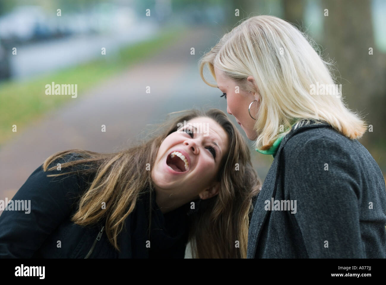 Two Caucasian Teenage Girls Fight Violently One Girl Screams With
