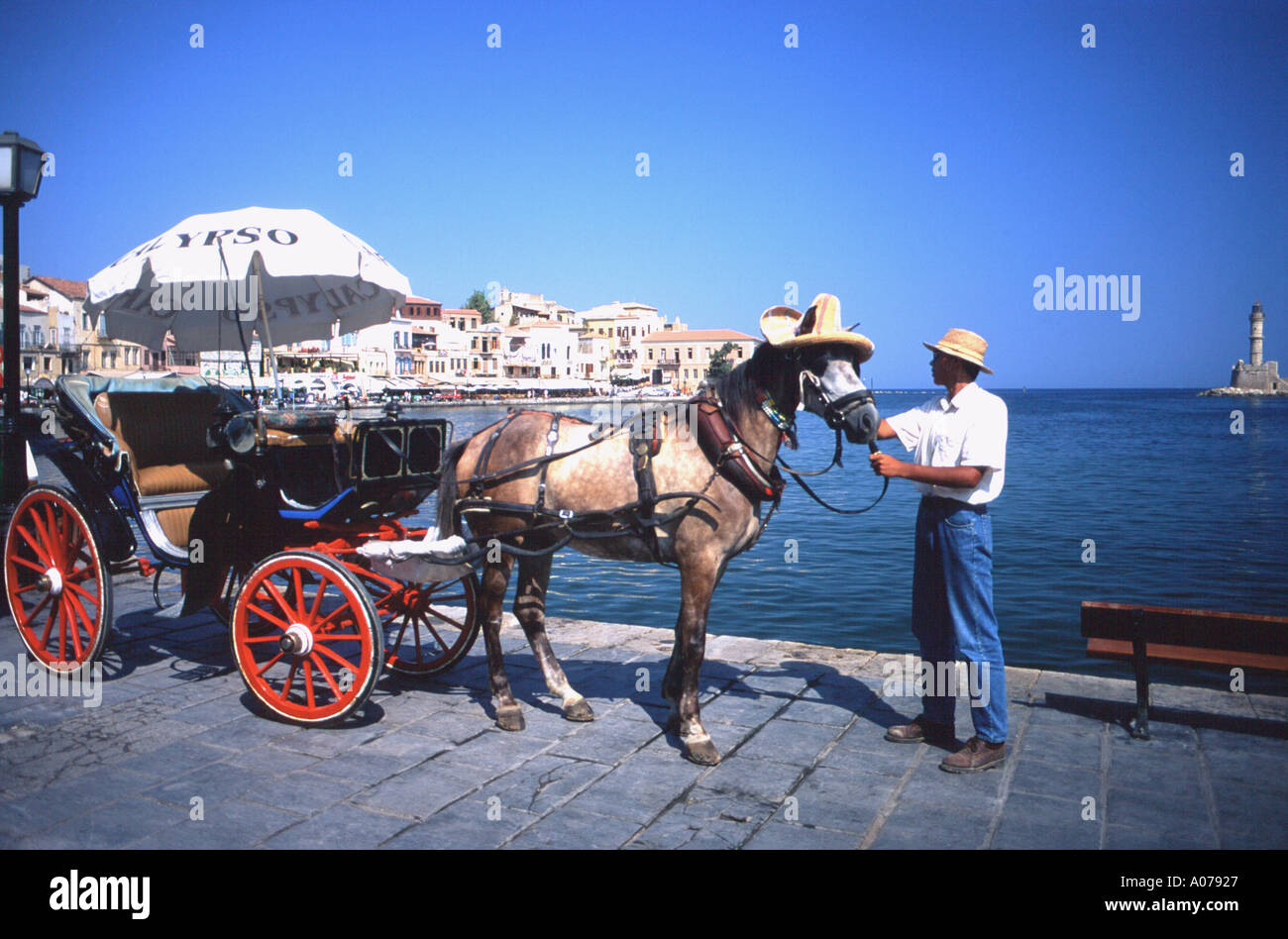 Standing in Line Horse Drawn Carriage Chania Xania Harbour Harbor Crete Greek Island Eu European Union EEC Greece Europe Stock Photo