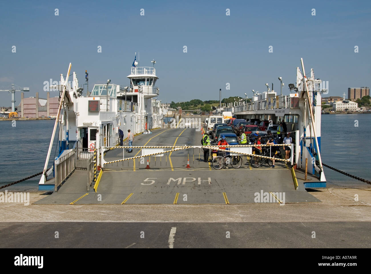 DepartingTorpoint Cornwall to Devonport in Devon chain ferry for vehicle & pedestrian use crossing the Hamoaze estuary of The River Tamar England UK Stock Photo