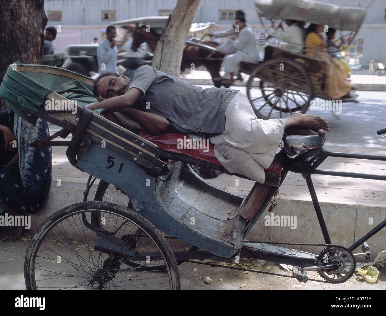 Resting rickshaw driver india hi-res stock photography and images - Alamy