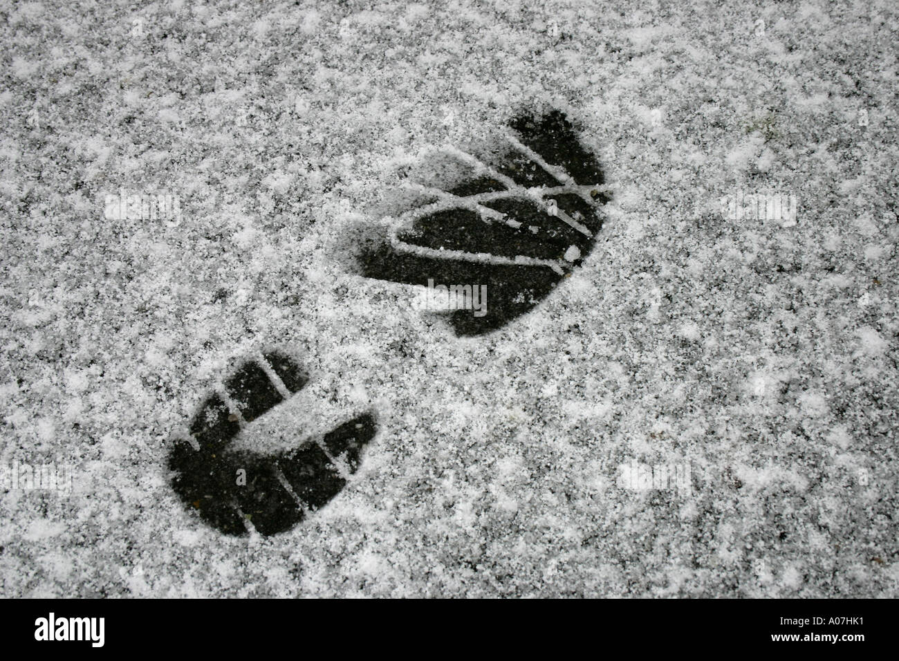 shoe print in snow. (c) by uli nusko, ch-3012 bern Stock Photo