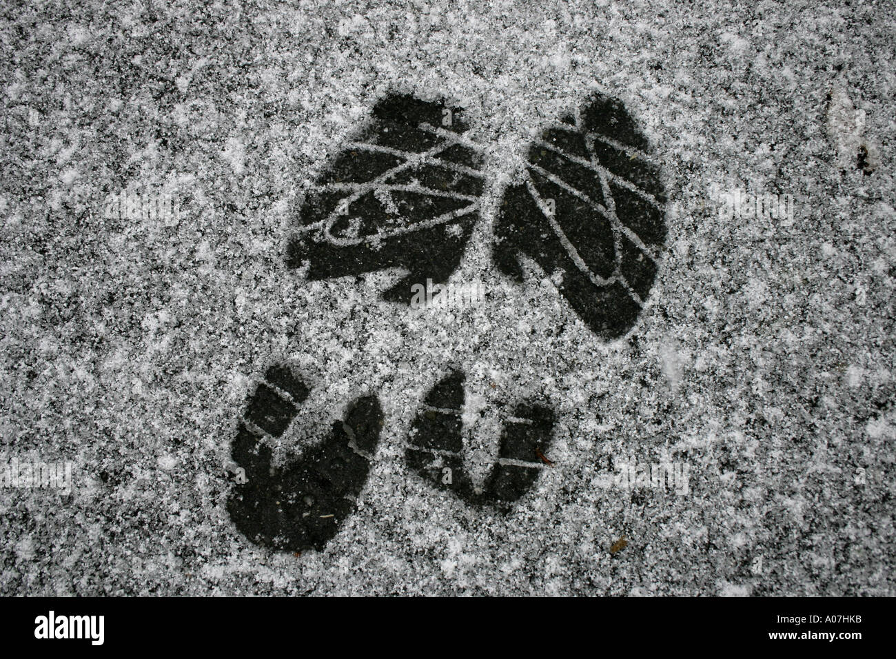 shoe prints in snow. (c) by uli nusko, ch-3012 bern Stock Photo