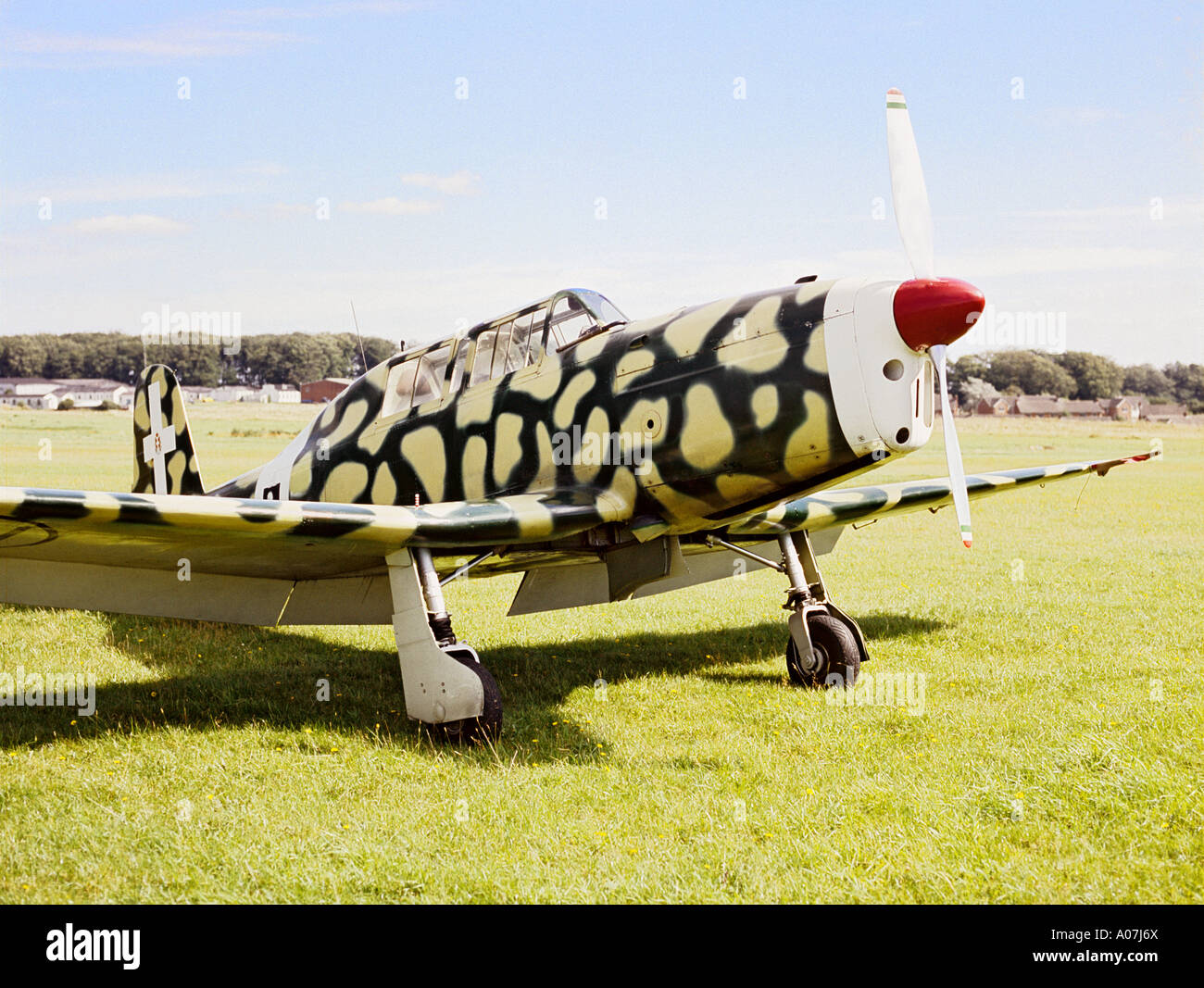 Italian Fiat G46 training aircraft in camouflage paint on a grass airfield Bucks Uk EU in the 1970 s Stock Photo