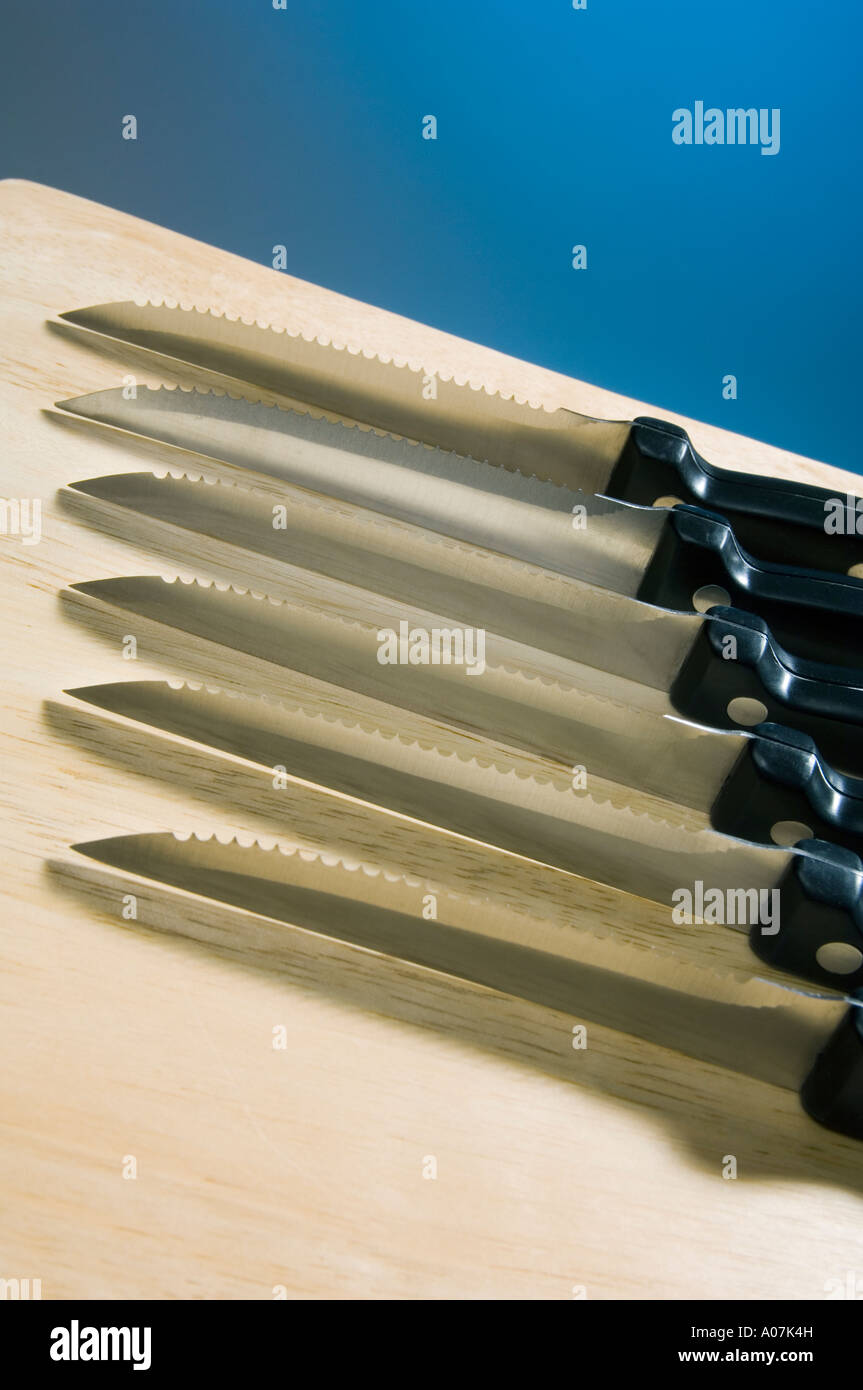 Stainless steel kitchen knives or steak knives, with serrated edges
