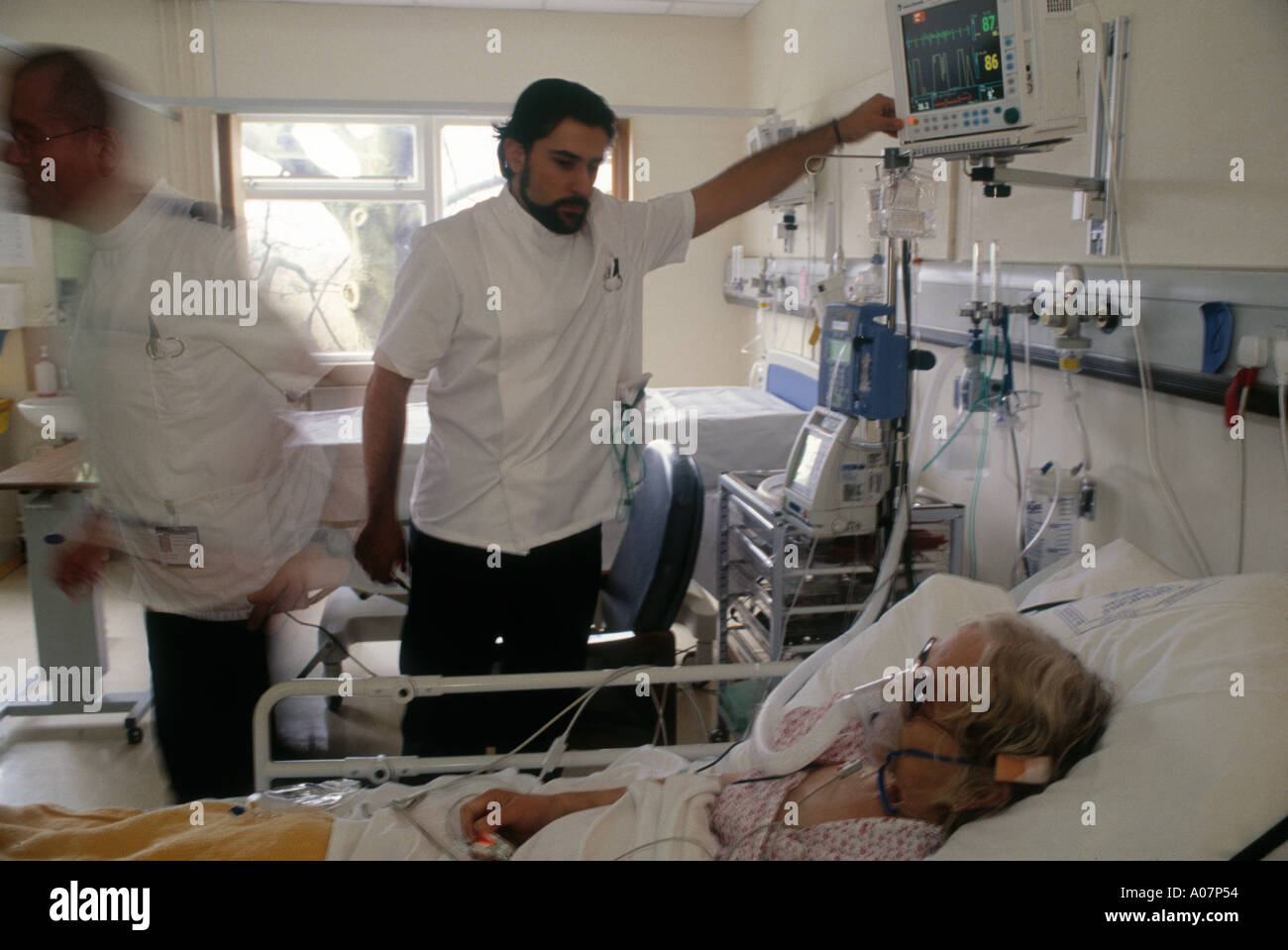 Spanish Nurses take care of patients in hospital NHS hospital blackburn Stock Photo