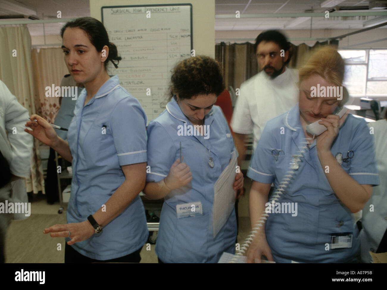 Spanish Nurses take care of patients in hospital NHS hospital Blackburn Stock Photo
