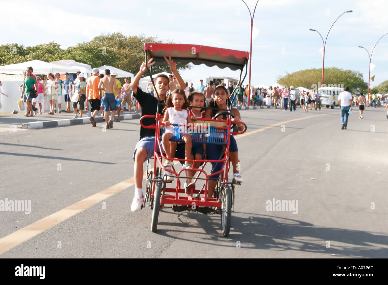 children in a cycle buggy Porto Alegre Brazil Stock Photo Alamy