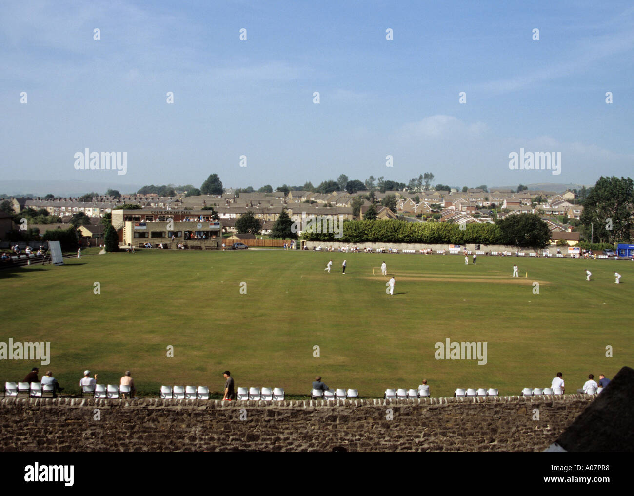 Playing cricket at Colne Cricket Club Stock Photo