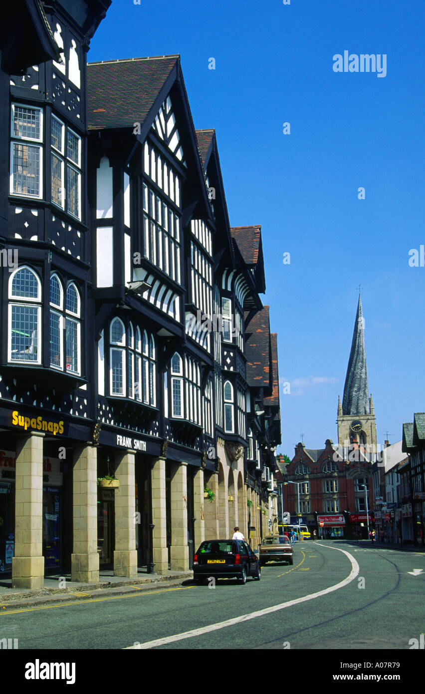 Half timbered buildings in Knifesmithgate and the twisted church steeple Chesterfield Derbyshire England Stock Photo