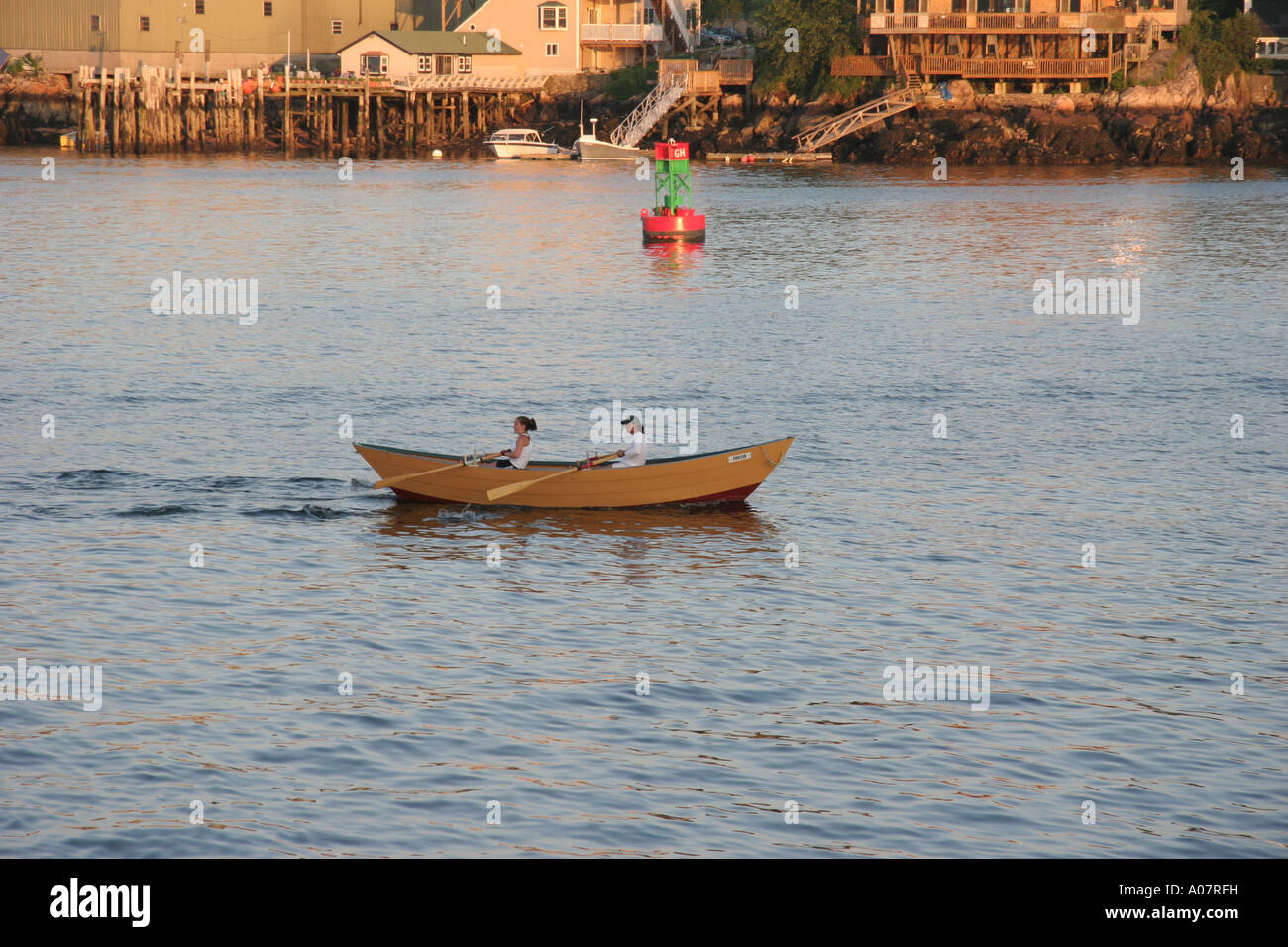 Girls Rowing Dory Stock Photo Alamy