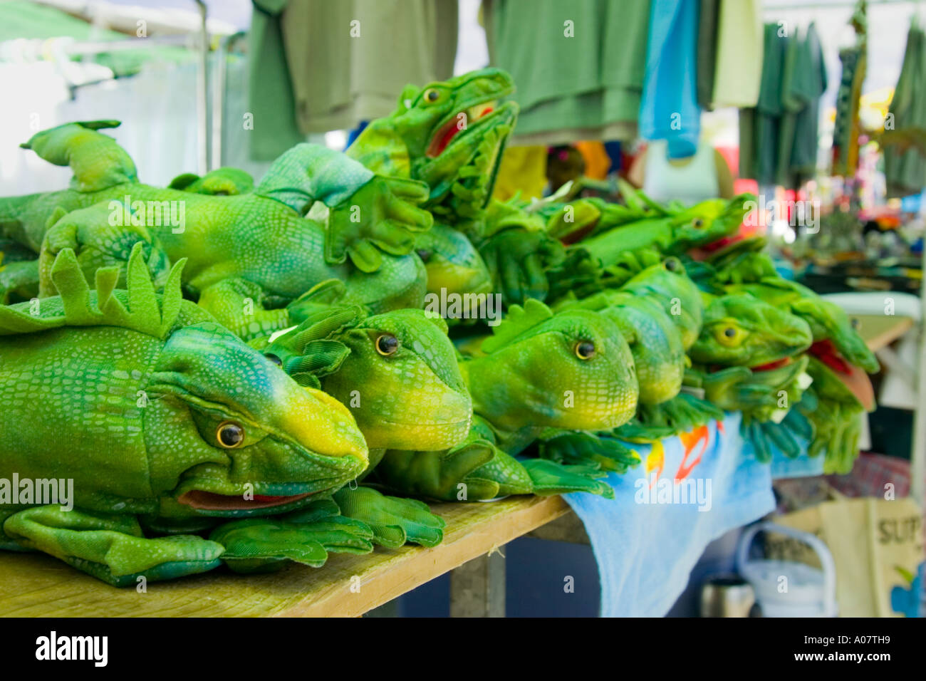 stuffed toy iguana for sale in market near Stock Photo - Alamy