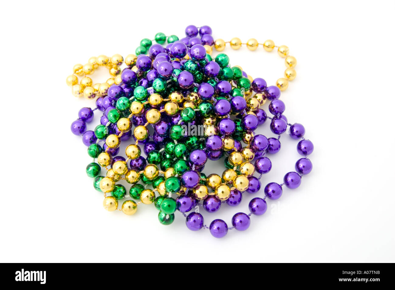 Mardi gras beads purple green gold Stock Photo
