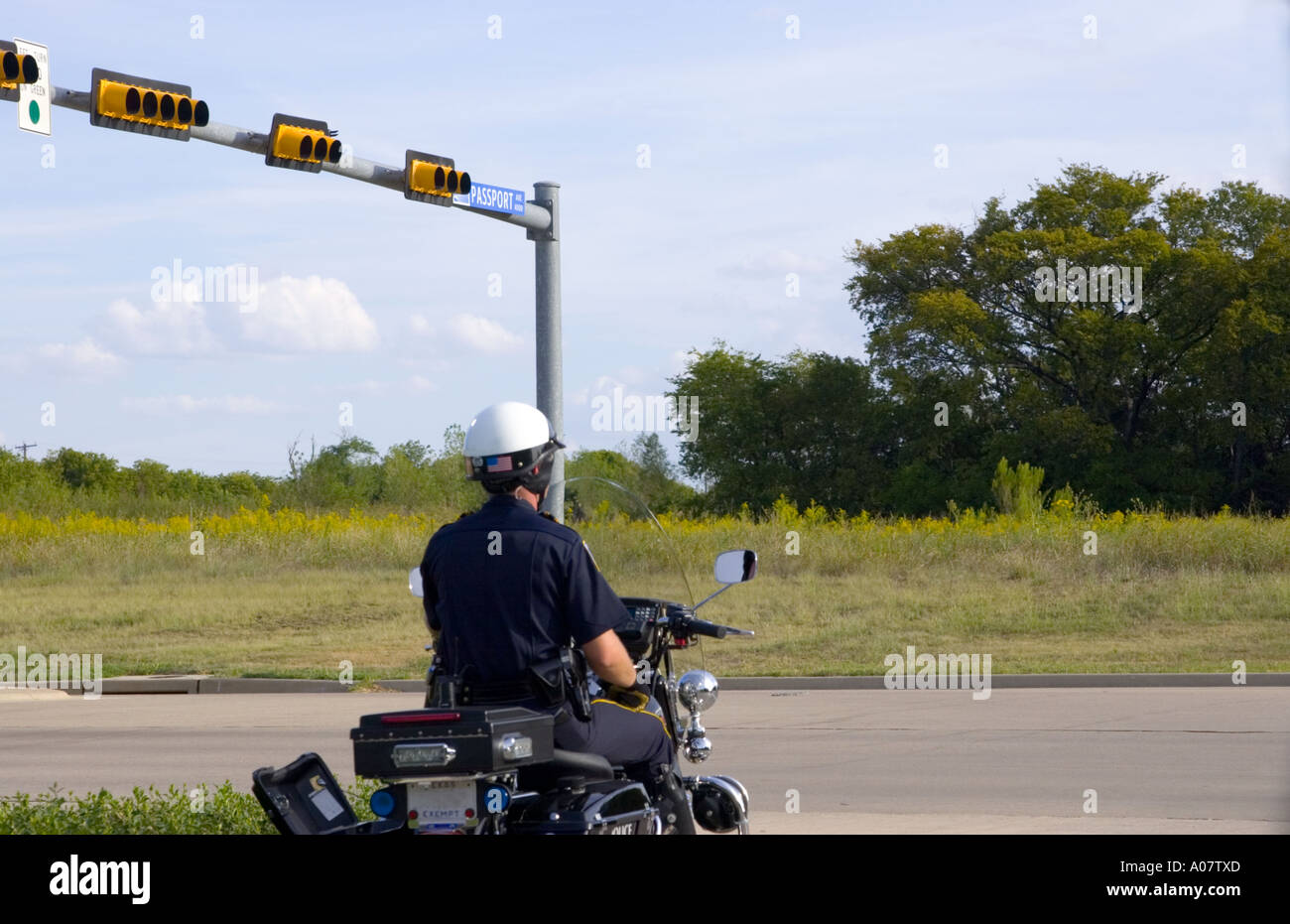 Police motorcycle speed trap near DFW airport Dallas Texas USA Stock Photo