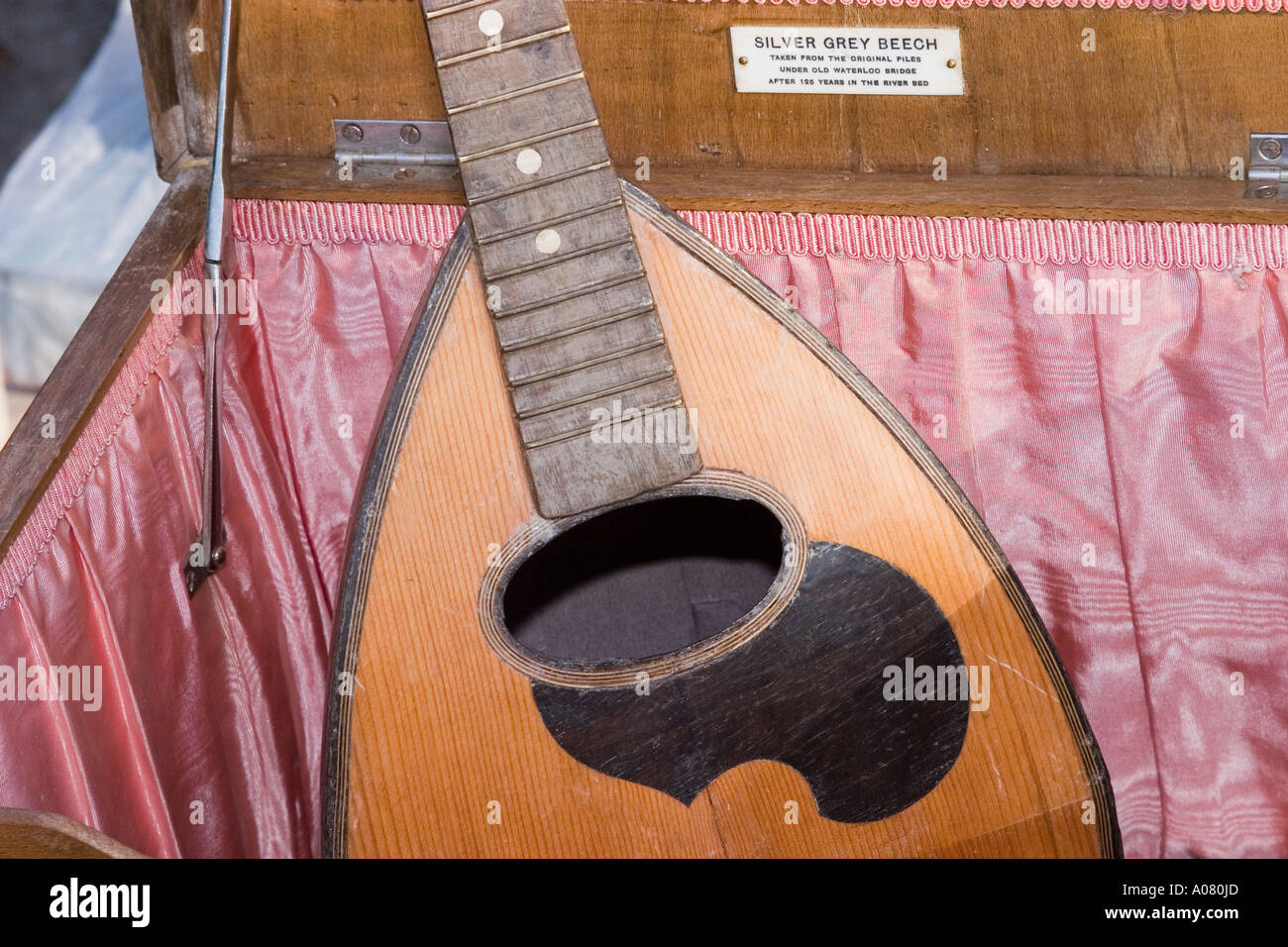 Antique mandolin in a case at the flea market Stock Photo Alamy